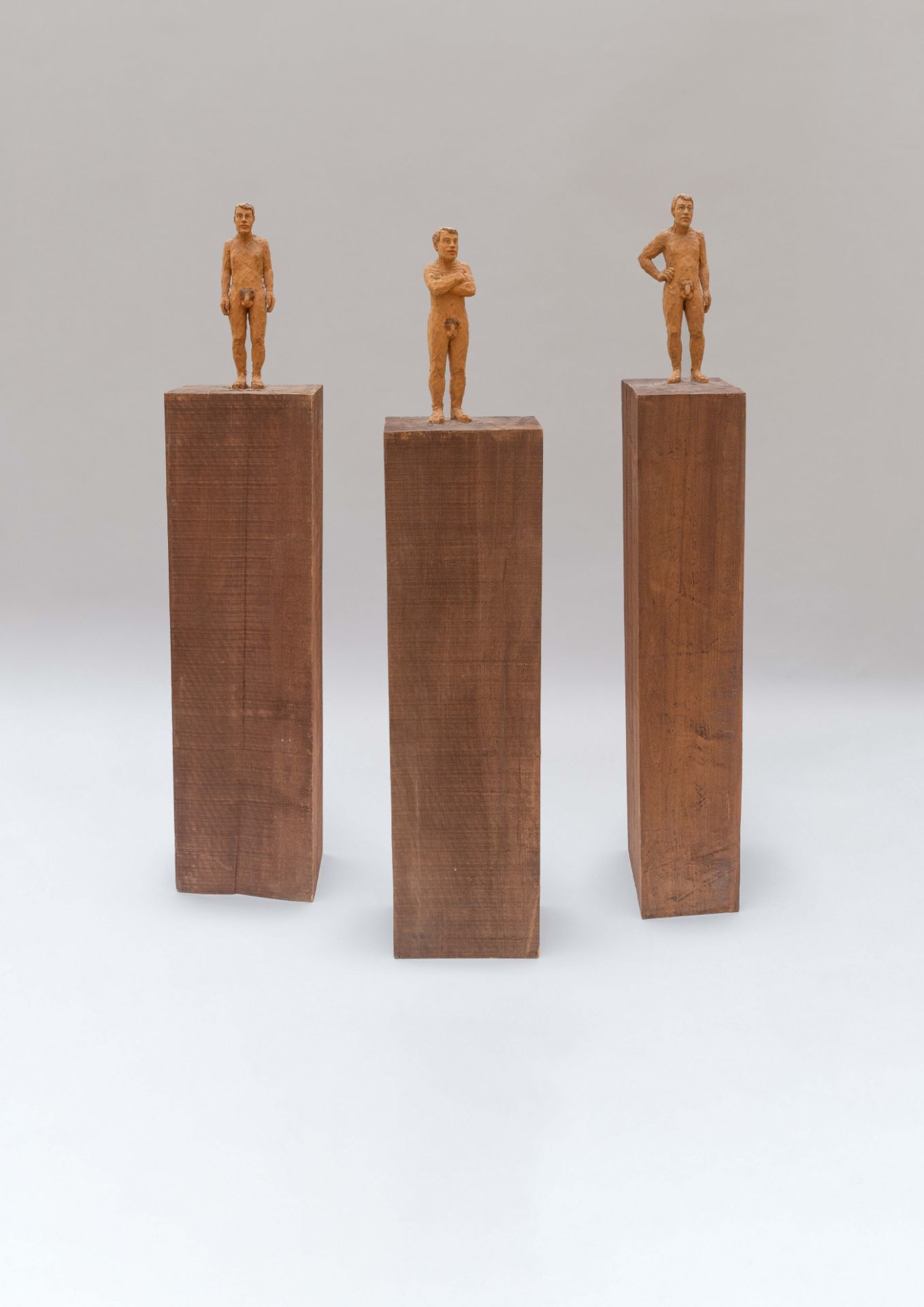 Stephan Balkenhol, 3 male nudes.3 figural columns. Coihue southern beech, partially polychrome. (