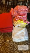 Job lot of red/white checkered table cloths, white table cloths and red seat cushions