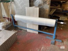 Roll of Part Used Plastic Shrink Wrap Material & Unroll Stand As Shown