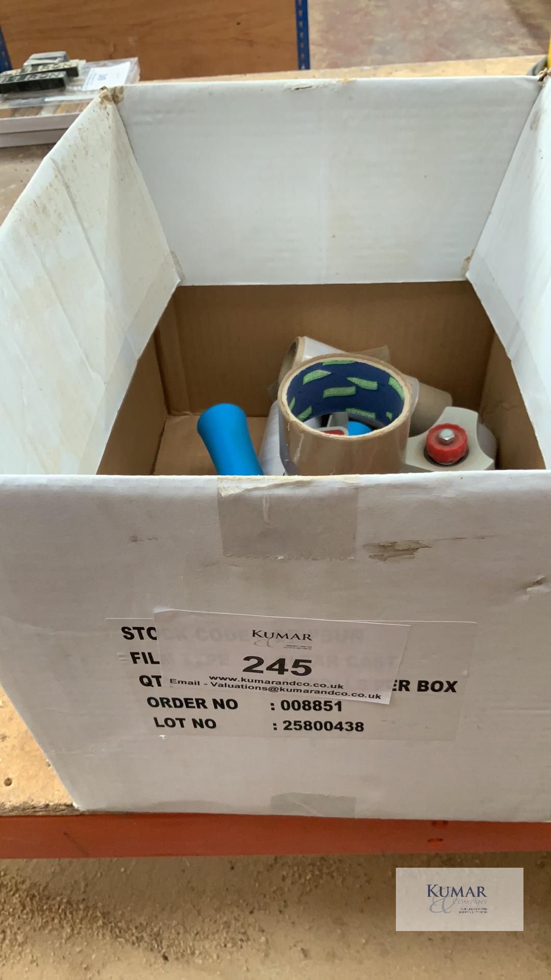 Box containing various packing items