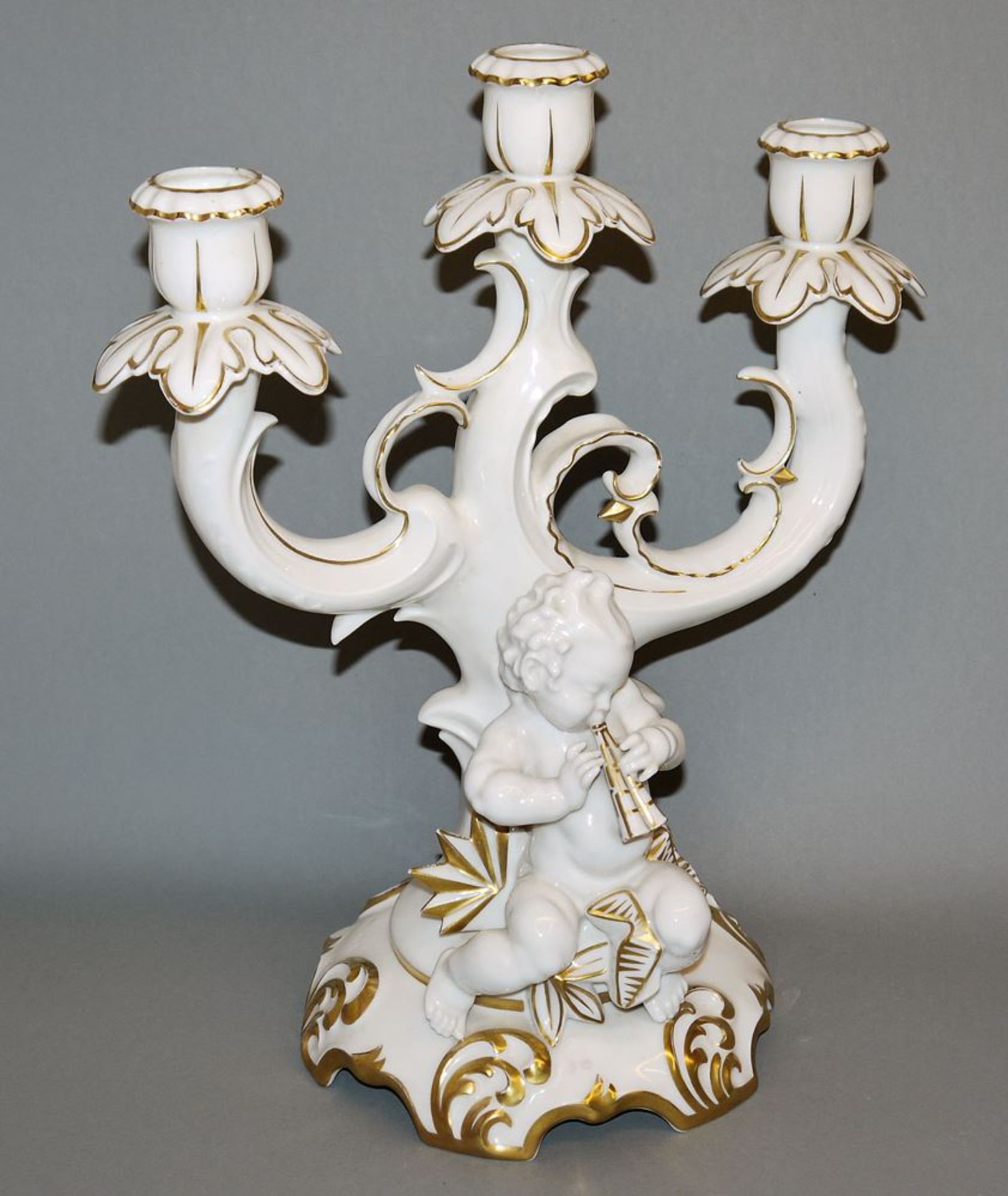 Great porcelain candlestick with putto, Karl Tutter for Hutschenreuther, c. 1920