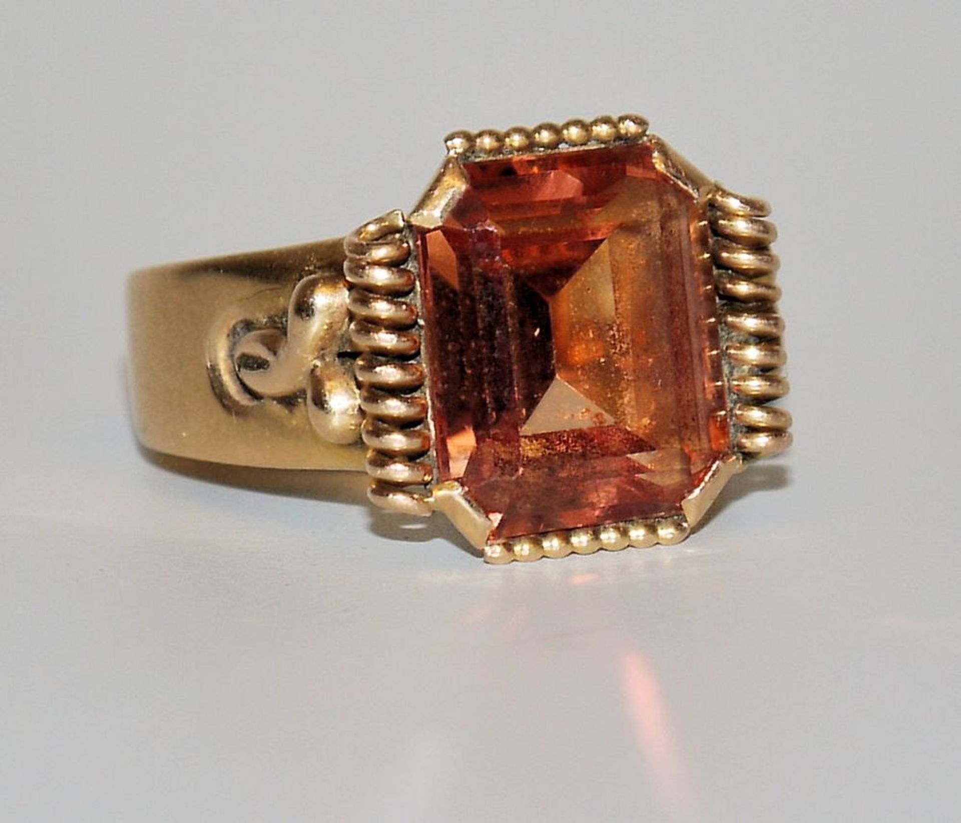 Heavy ring with Madeira citrine, gold, circa 1920/30