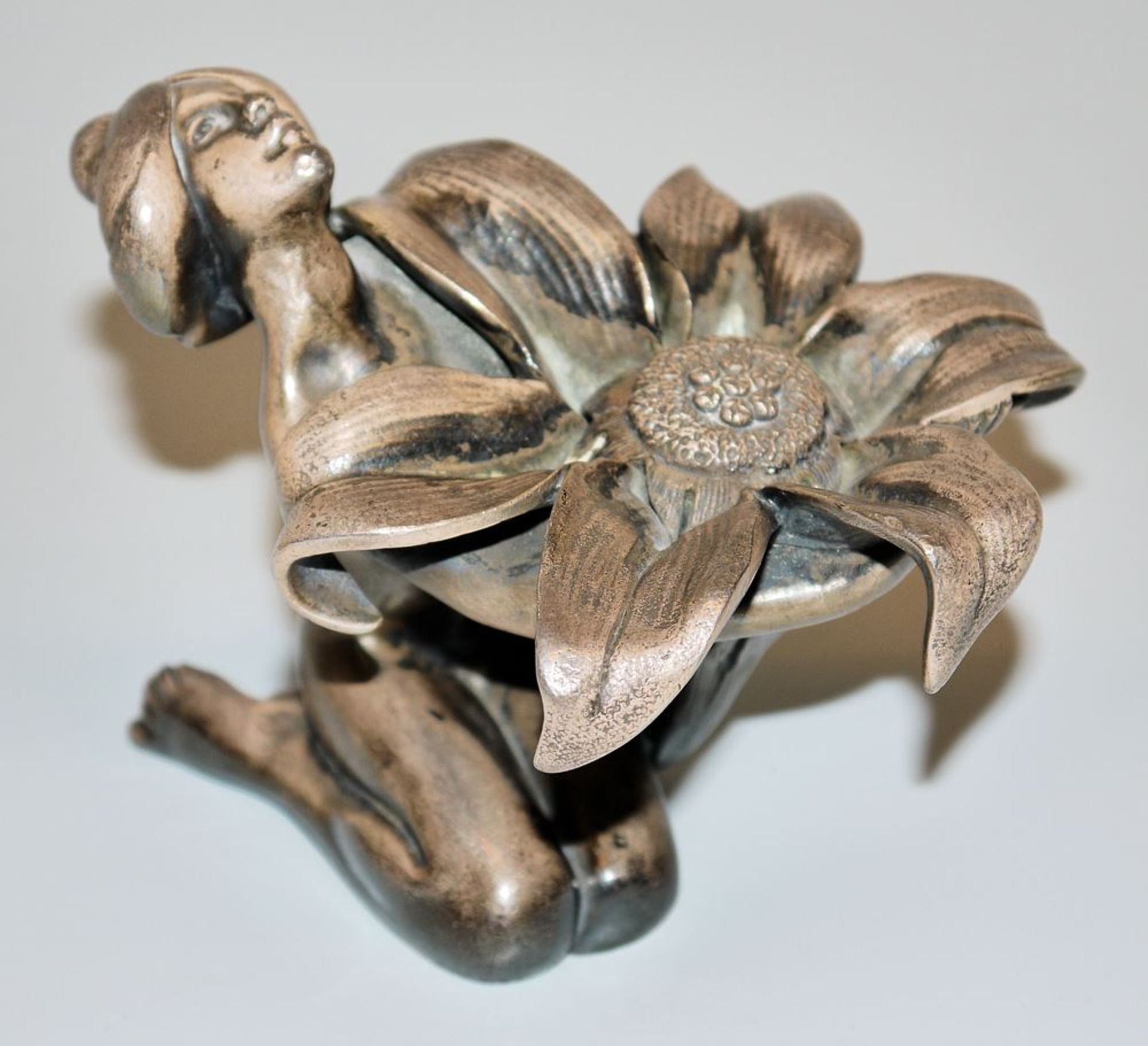 Female nude with flower<üte, silver-plated ornamental sculpture by Józef Fraget, Warsaw circa 1900