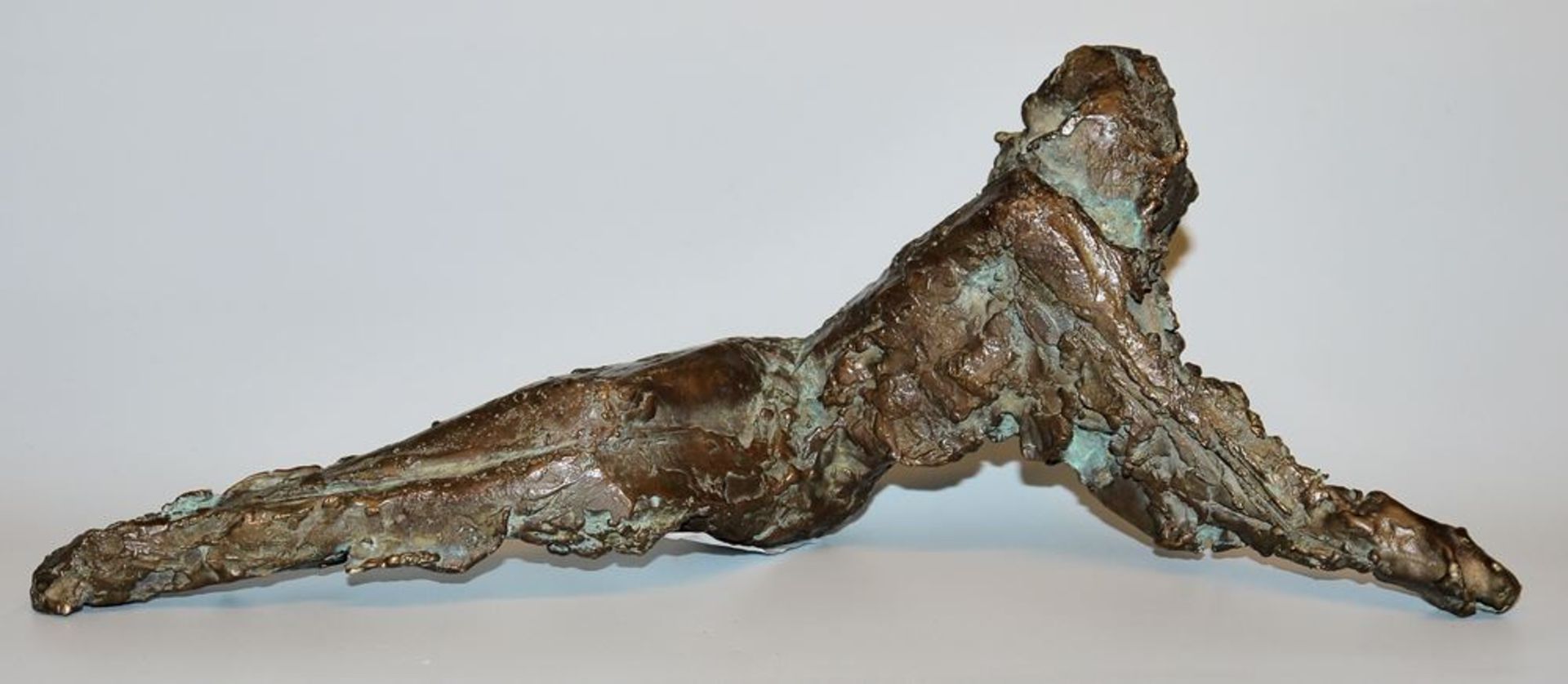 Karlheinz Oswald, Reclining female, signed bronze sculpture from (19)90, plus catalogue
