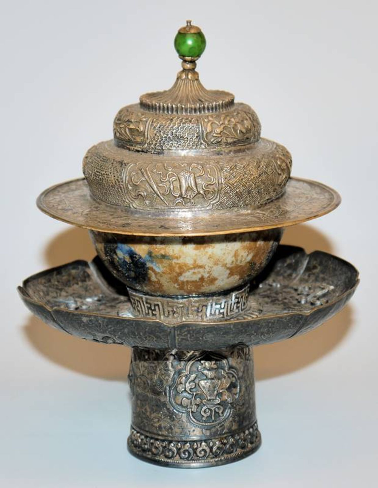 Tibetan silver tea cup stand with Chinese tea cup of the Ming period, 15th & 19th c.