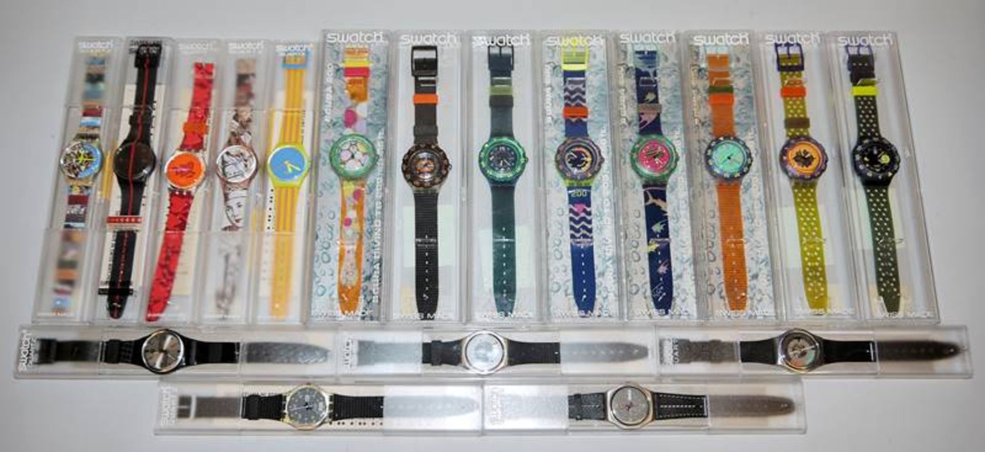 18 Swatch-Uhren, dabei Sammler-Raritäten, 1990er Jahre