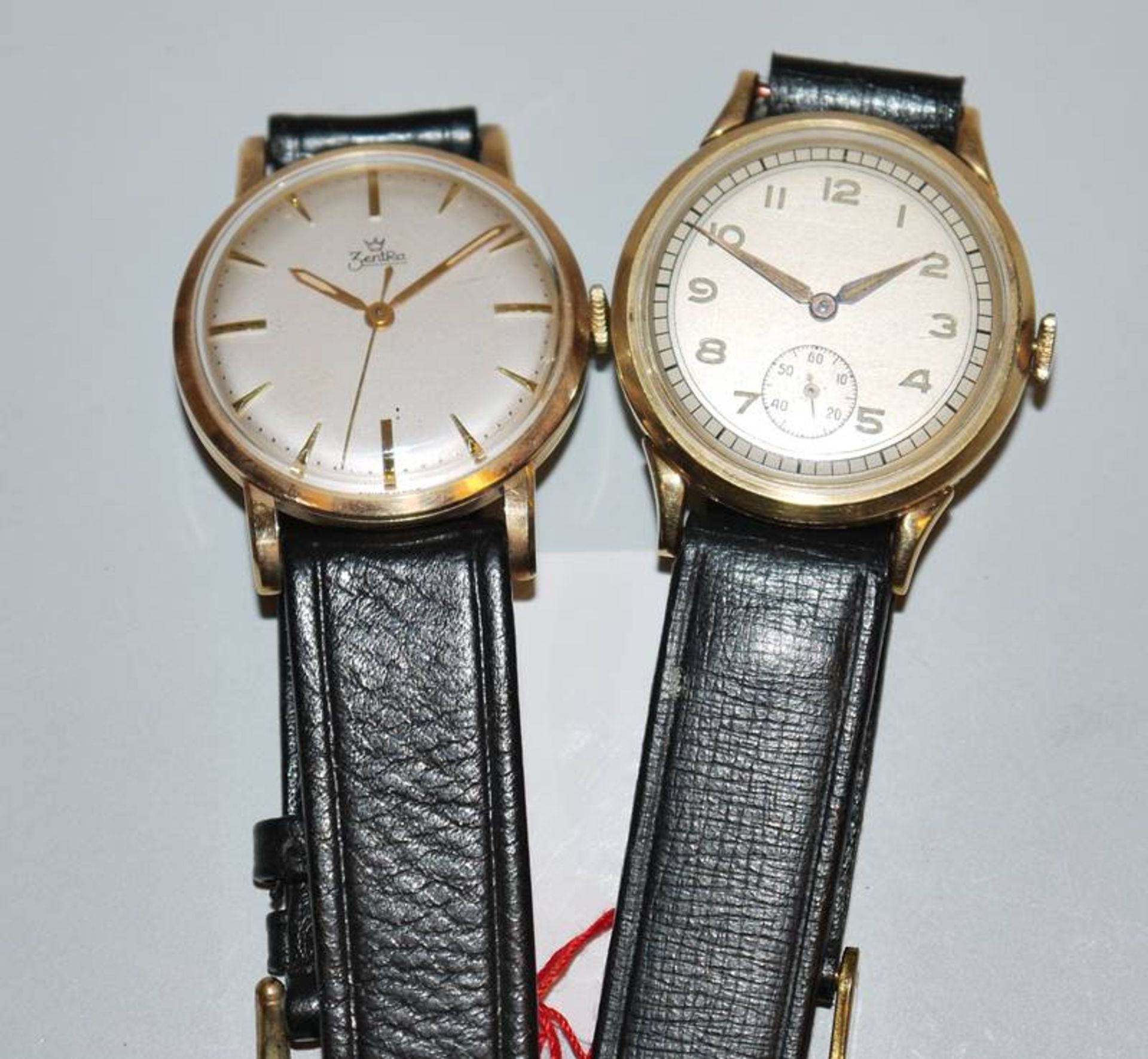 Zwei goldene Herrenarmbanduhren der 1950er/60er Jahre