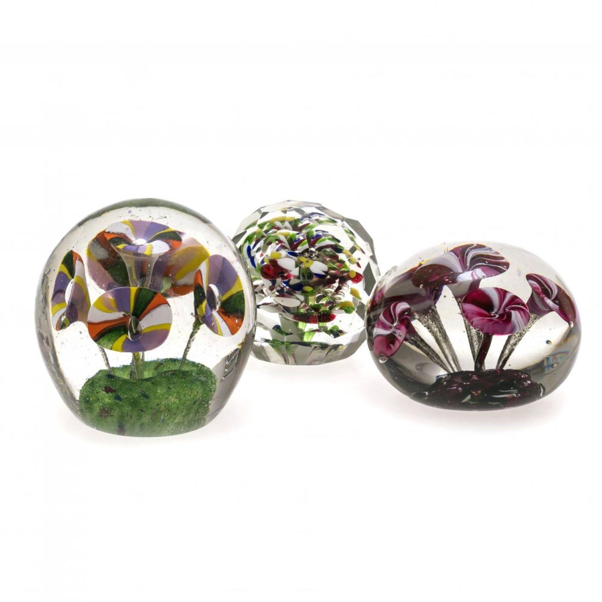 Drei Paperweights