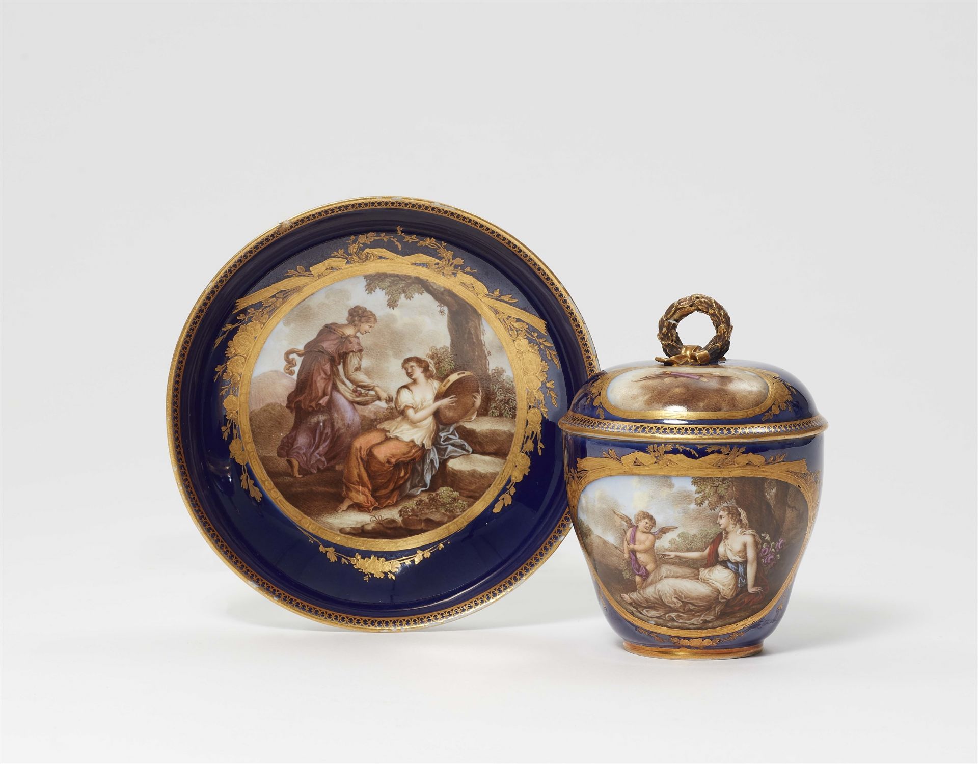 A Meissen porcelain cup and saucer with mythological decor