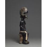 BAULE SEATED MALE FIGURE