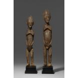 PAIR OF LOBI FIGURES