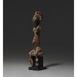 SENUFO SEATED FEMALE FIGURE