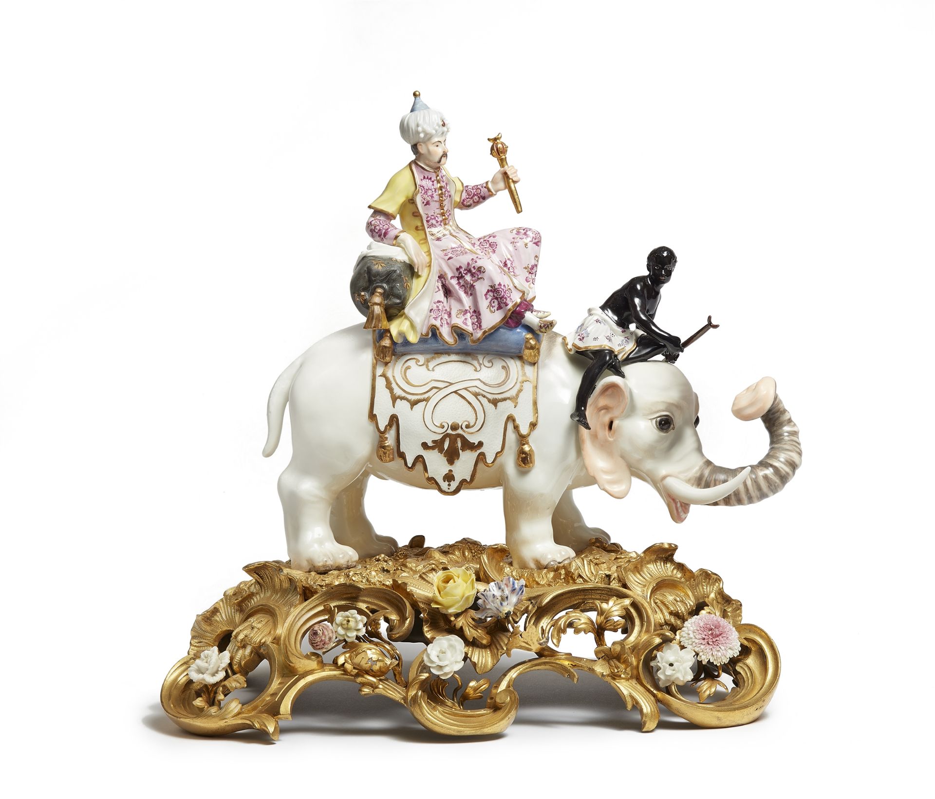 A Meissen porcelain model of a Sultan and an African on an elephant