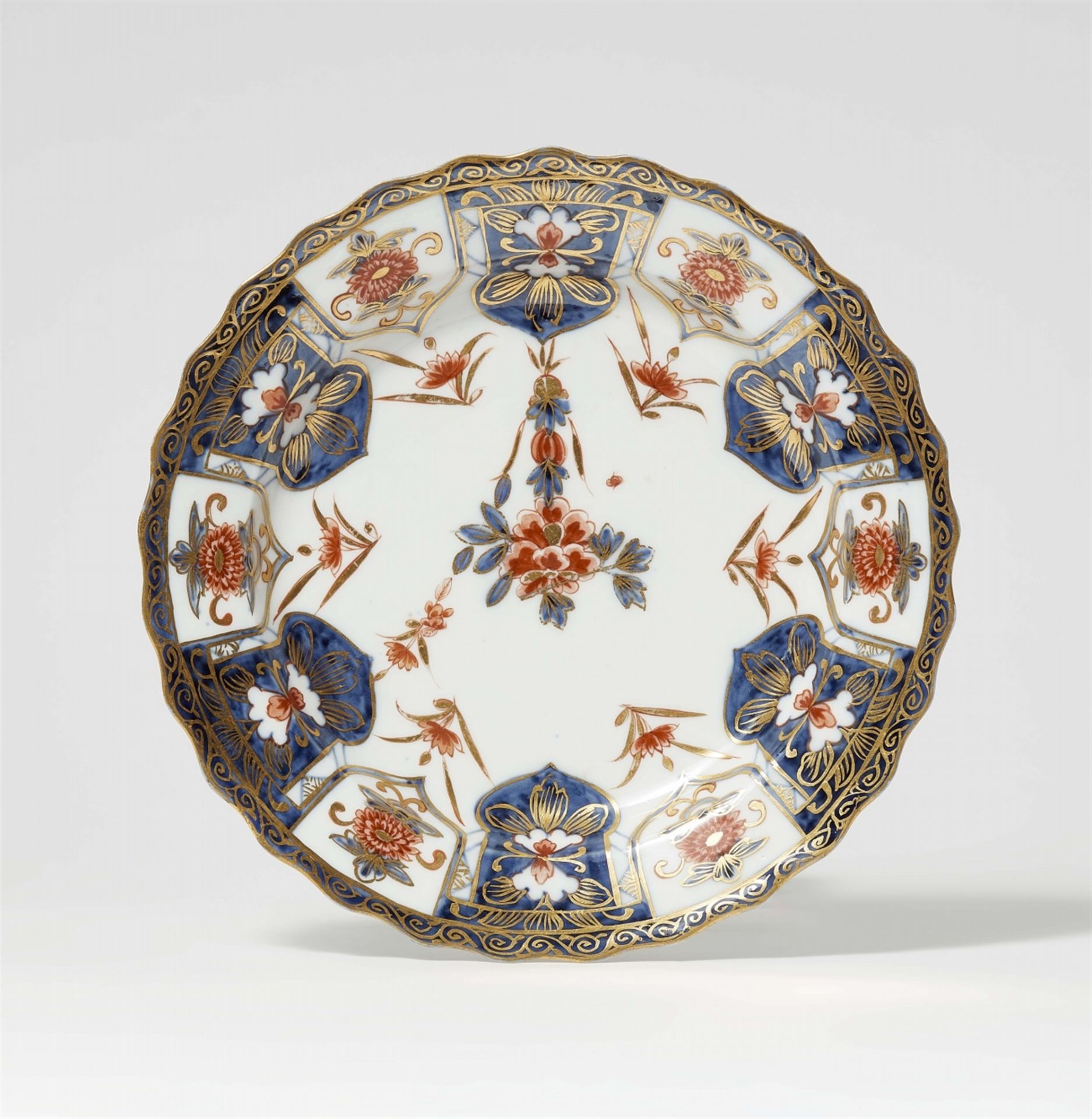 A Meissen porcelain plate with Japanese style lambrequin motifs
