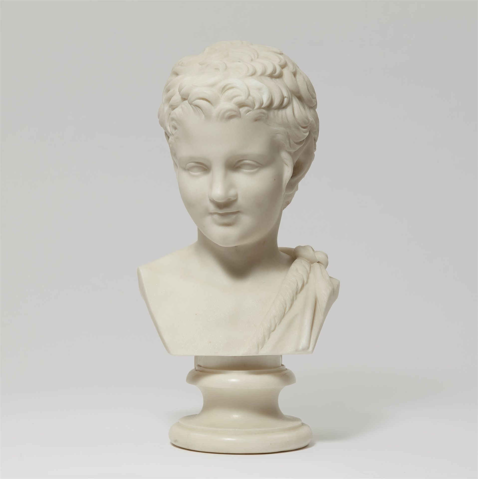 White Carrara marble bust of a young faun