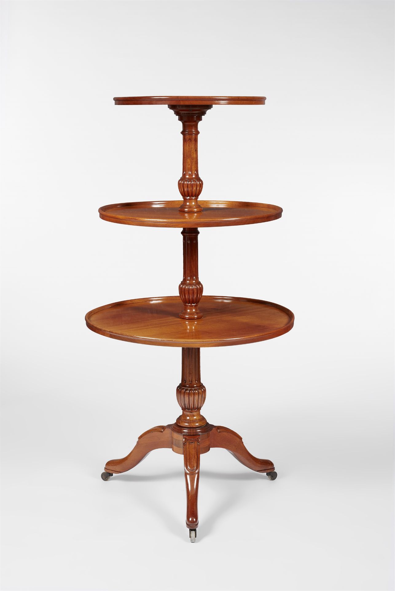 A mahogany tiered table