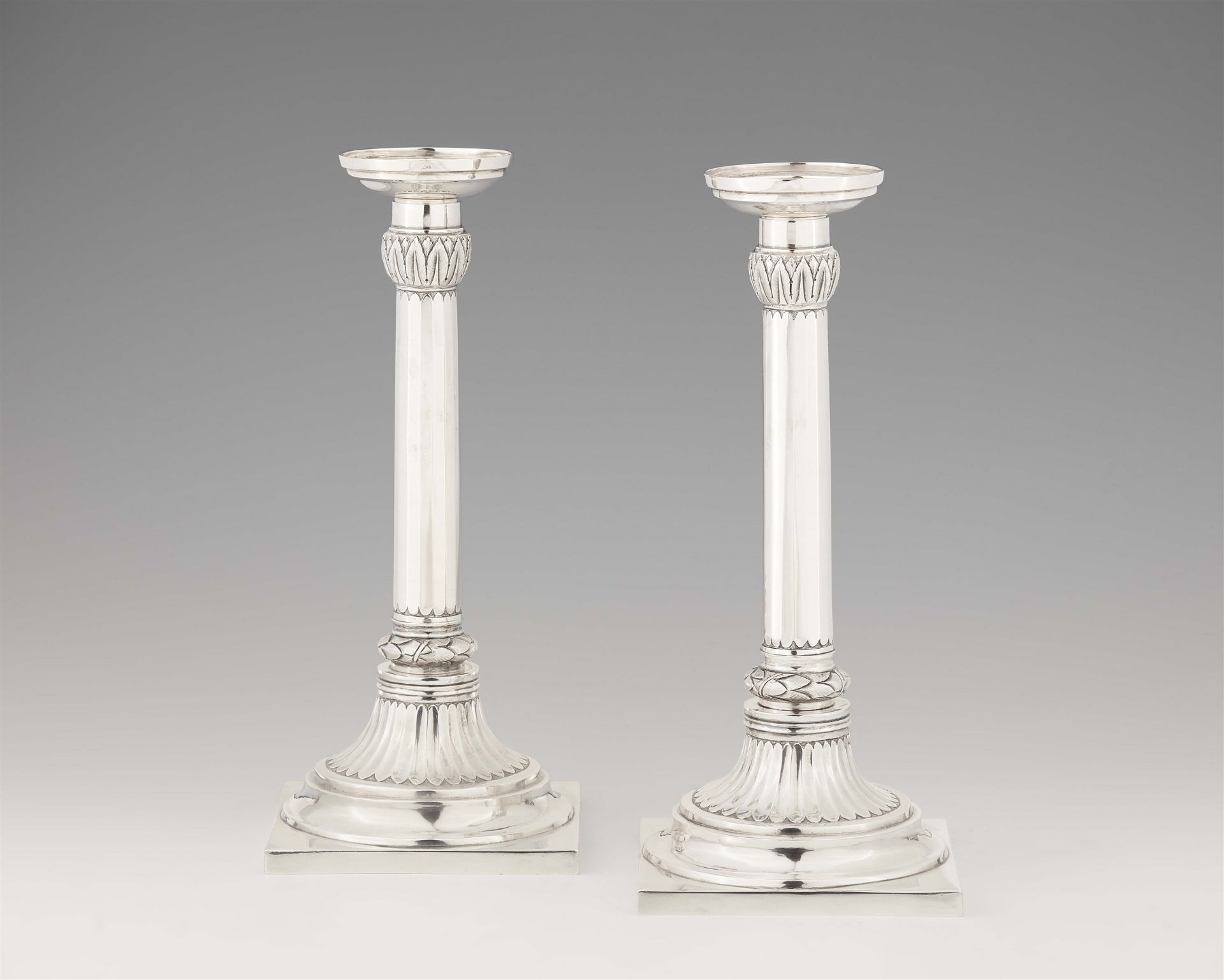 A pair of Zurich silver candlesticks
