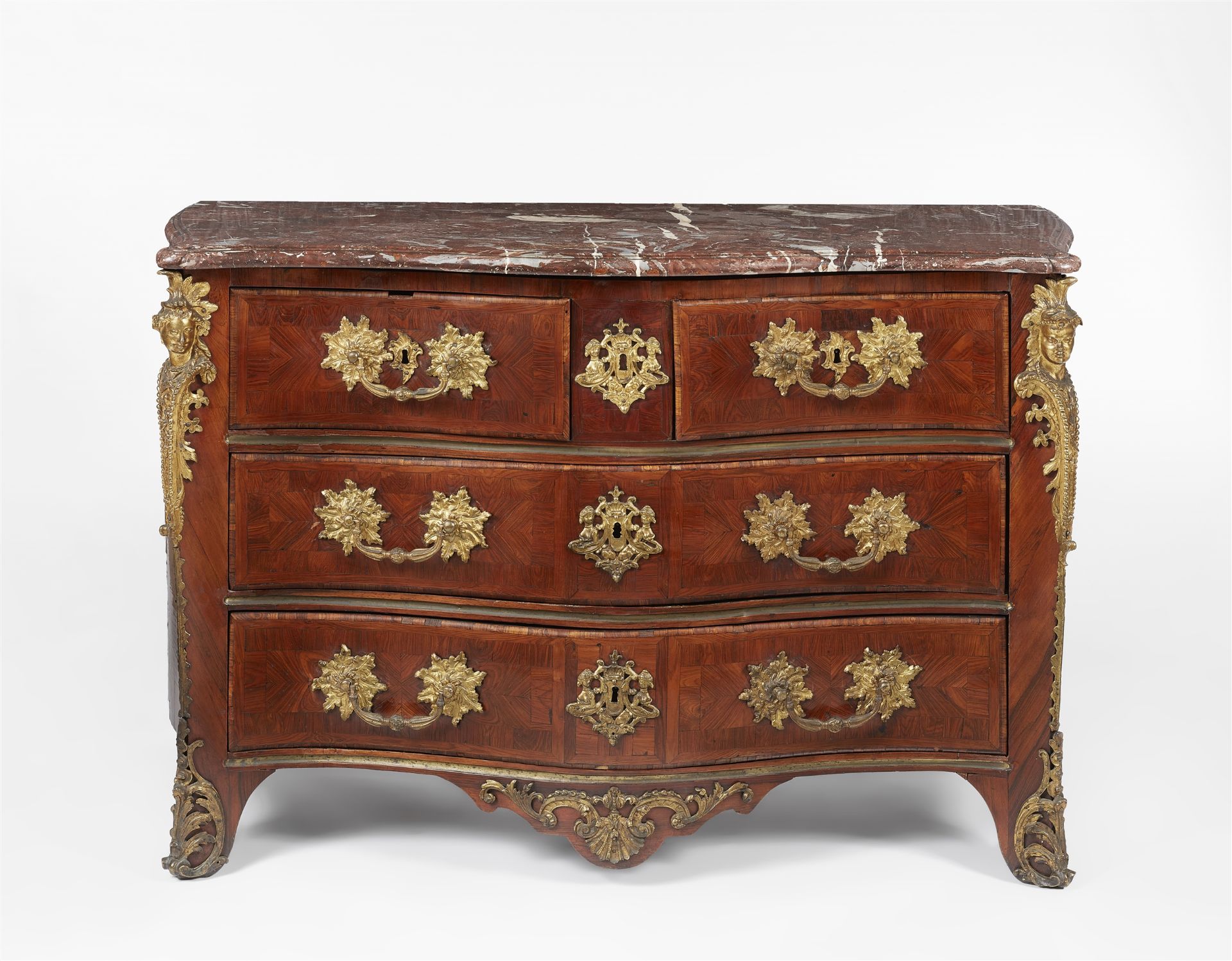 A Parisian Régence chest of drawers