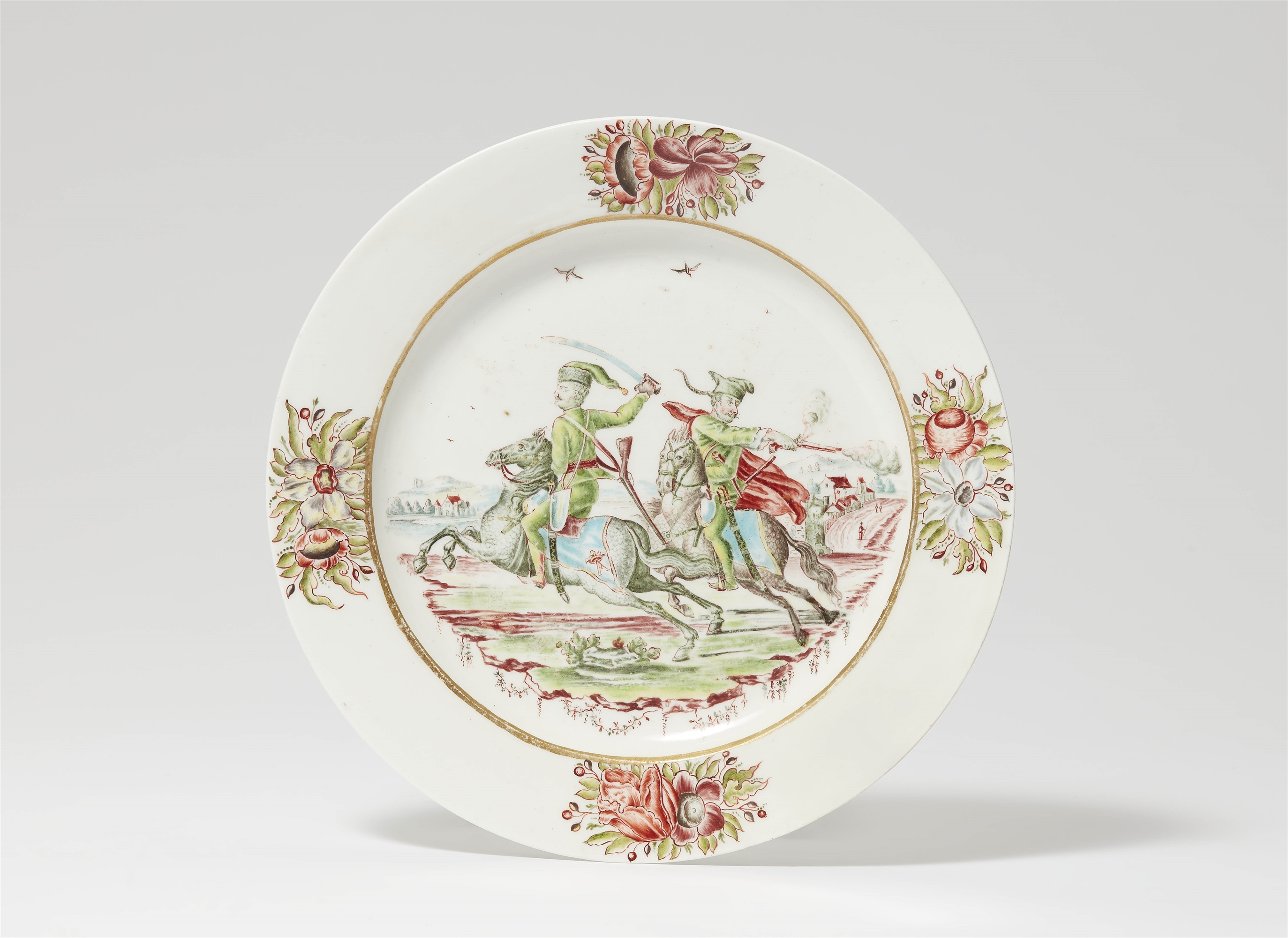 A Meissen porcelain plate with hussars