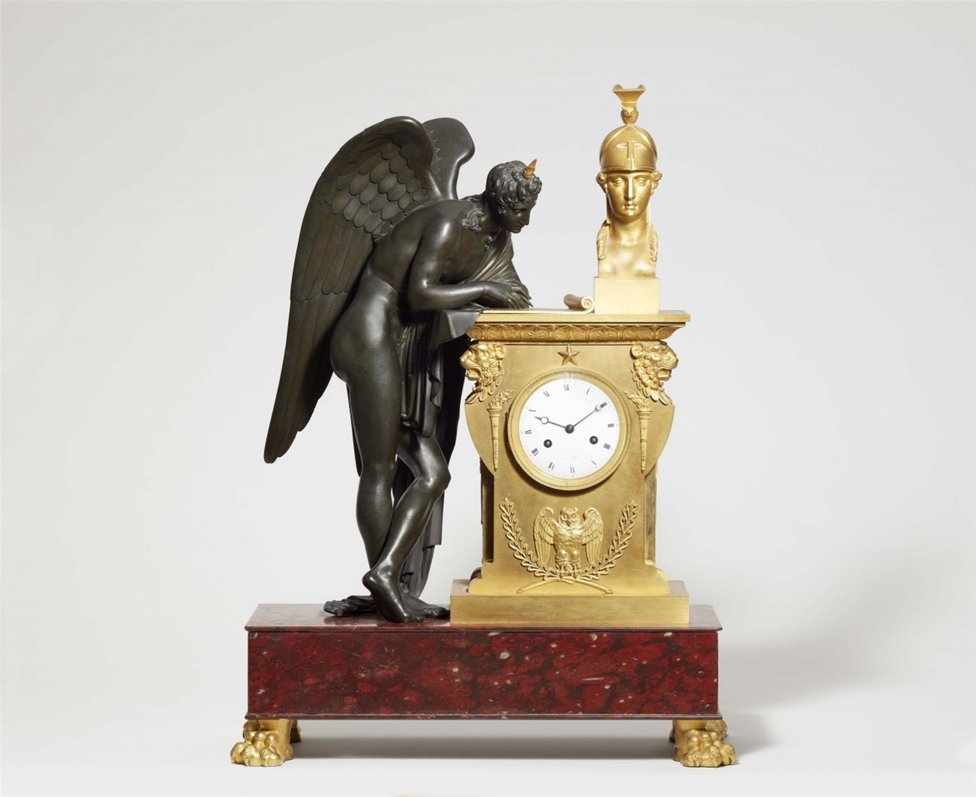 A large Parisian Empire ormolu clock “Genius inspired by Minerva”