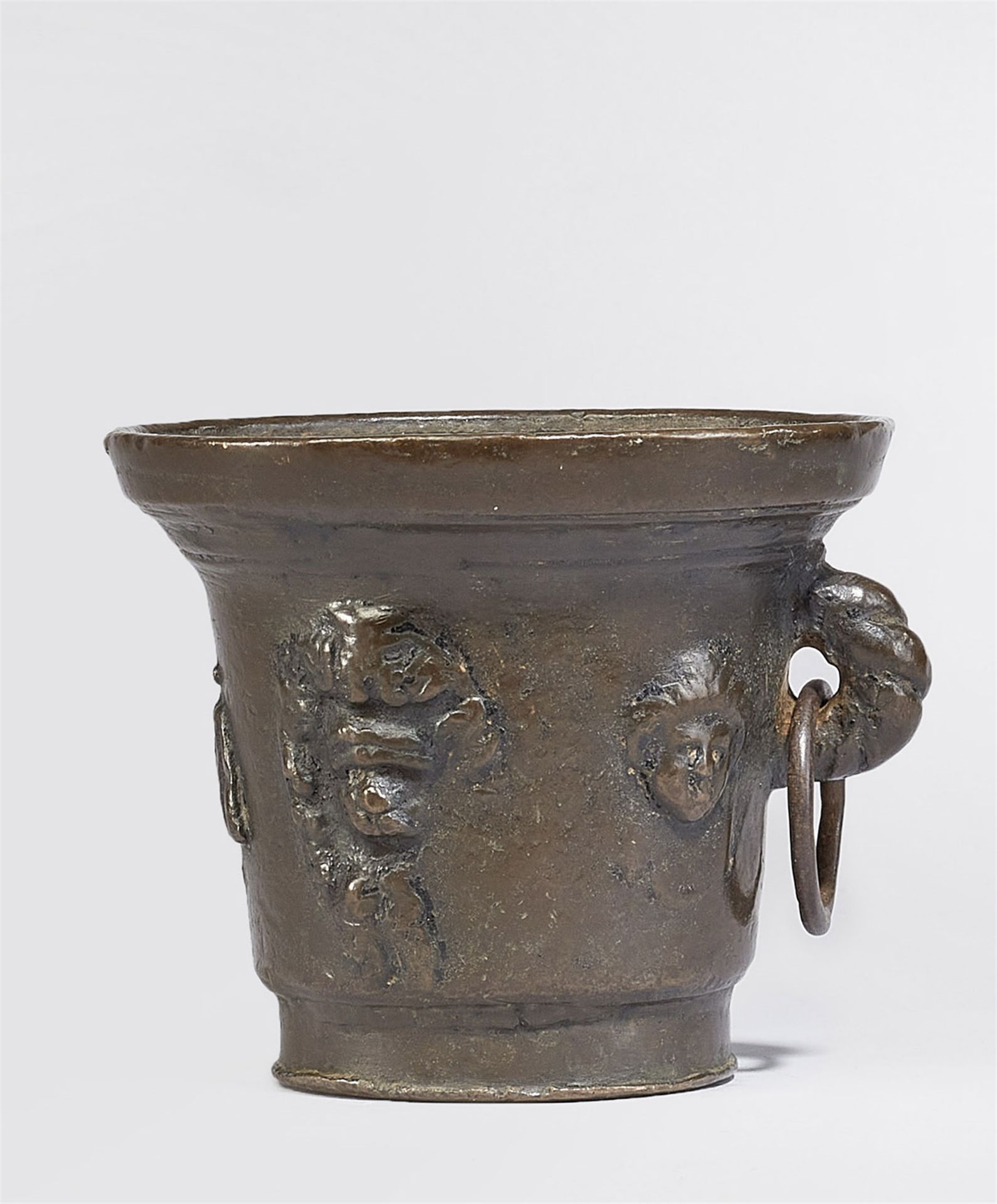 A Gothic single-handled mortar with mascarons