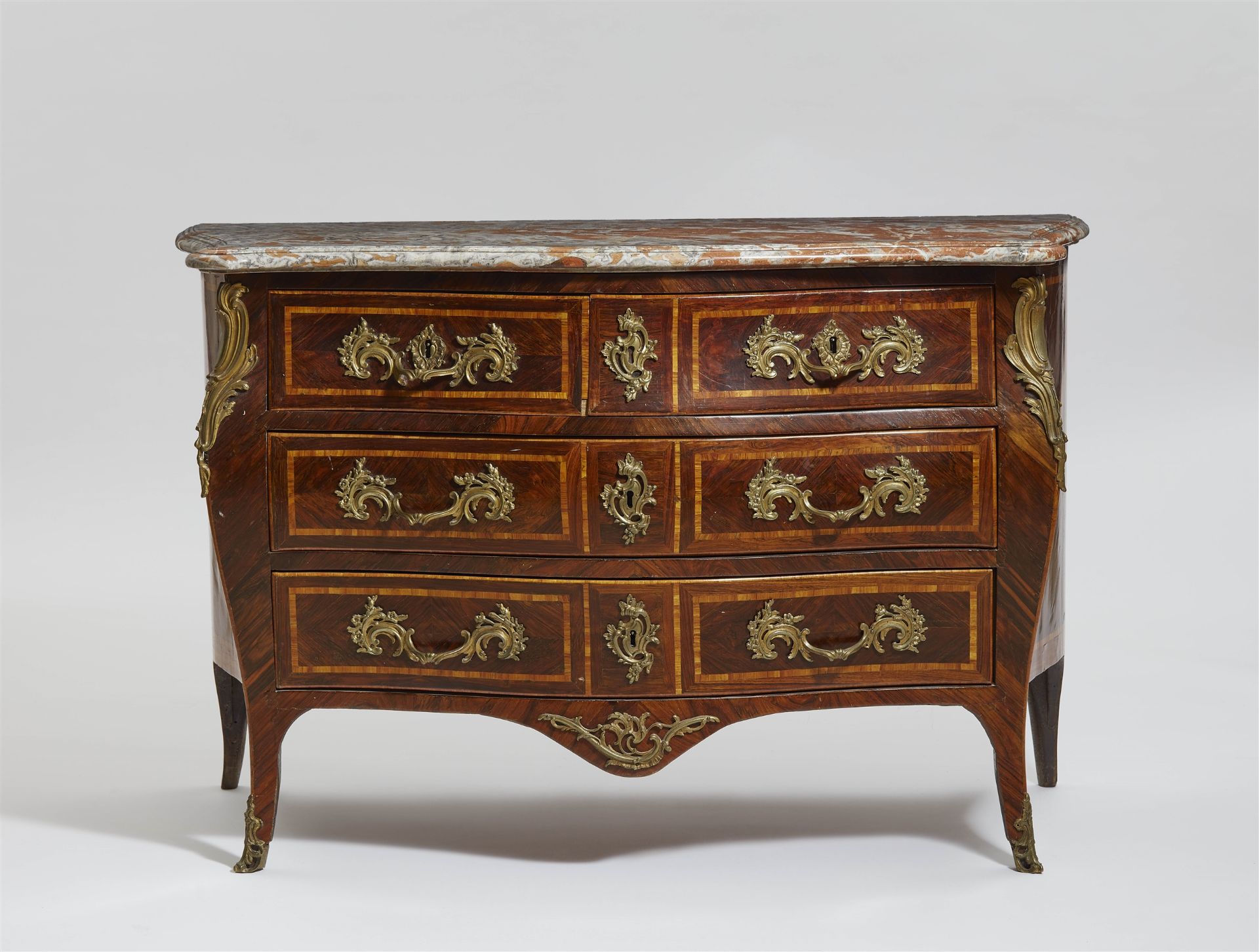 A Louis XV style chest of drawers