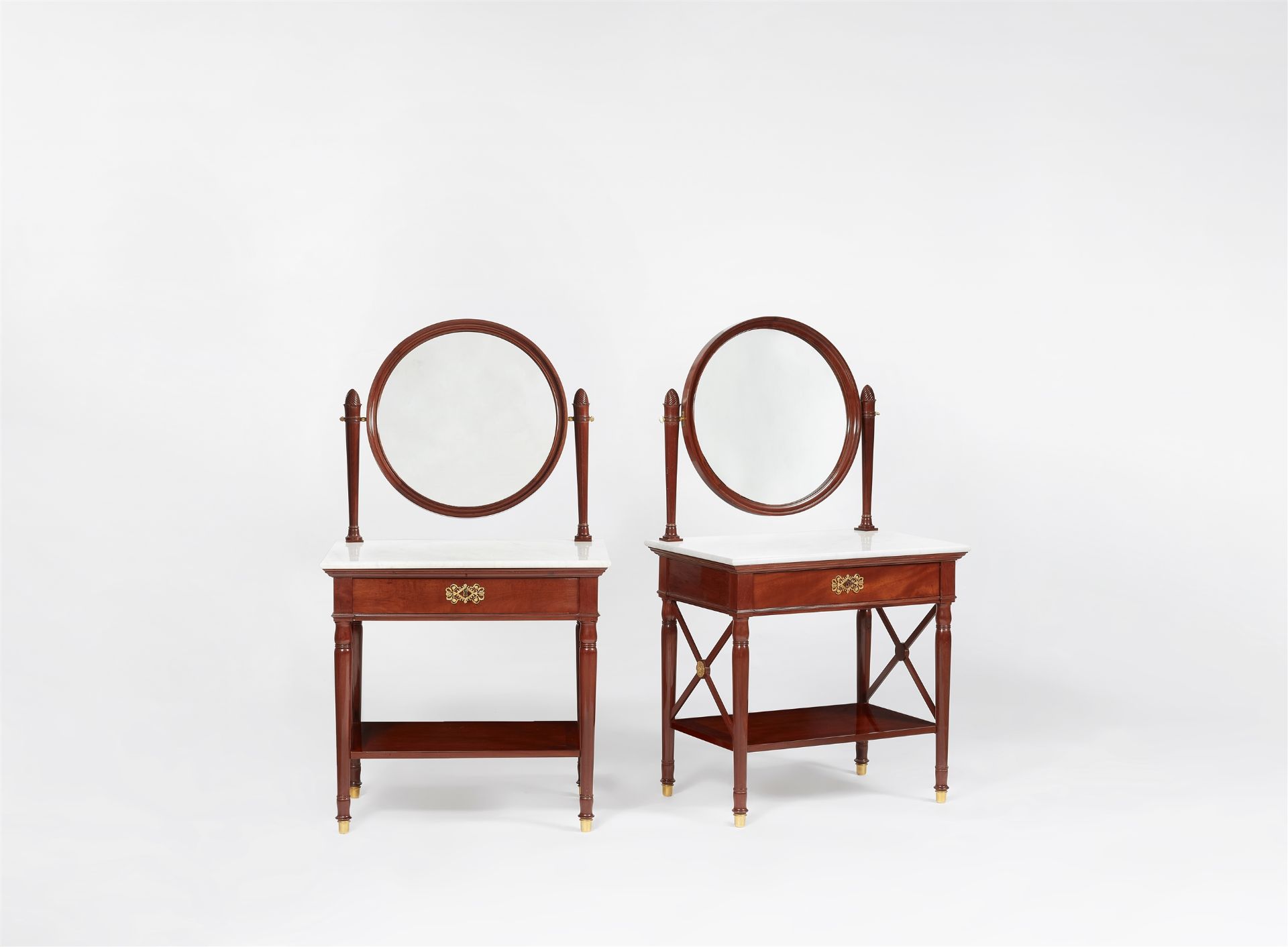 A pair of Empire mahogany dressing tables