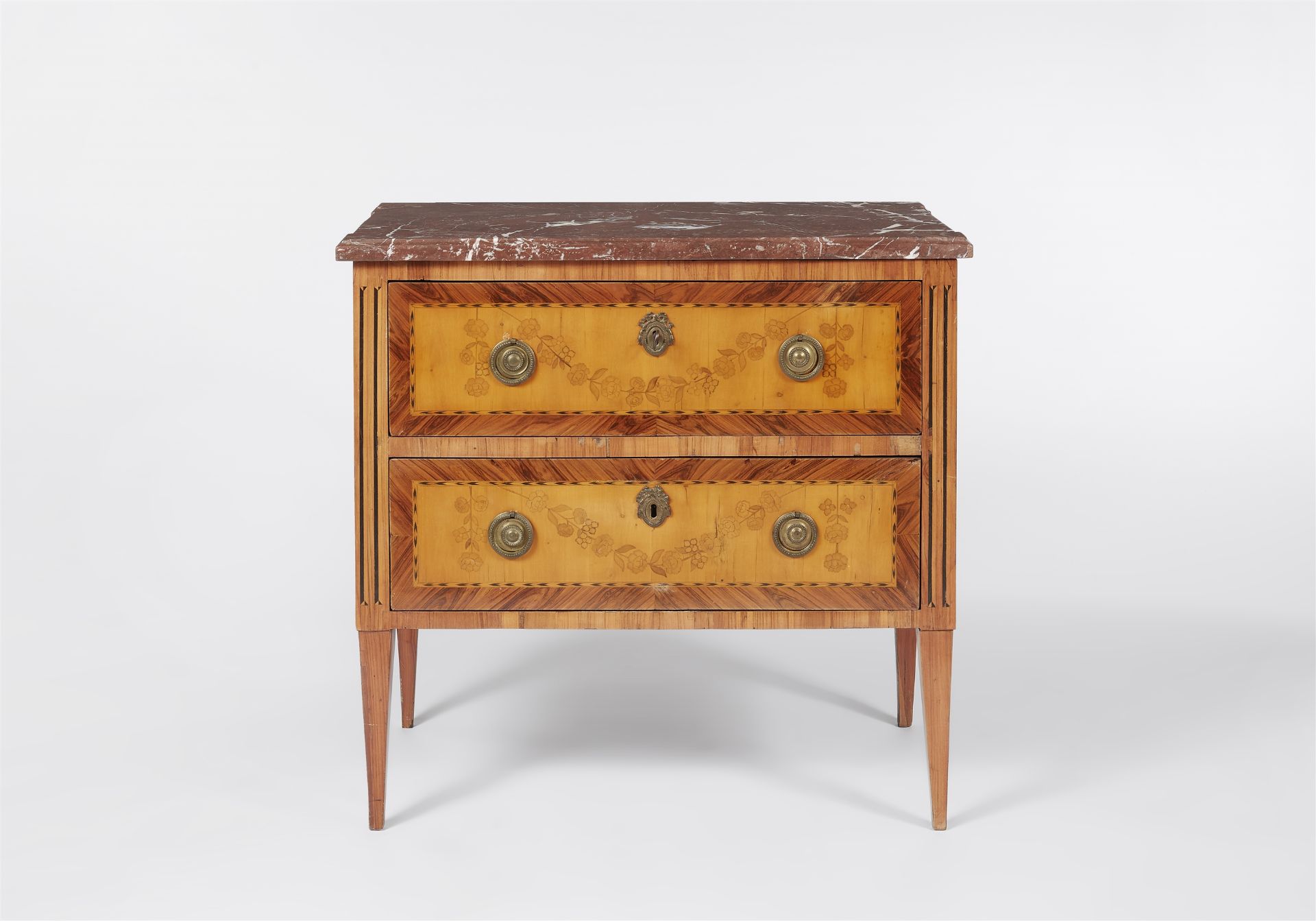 A Neoclassical chest of drawers