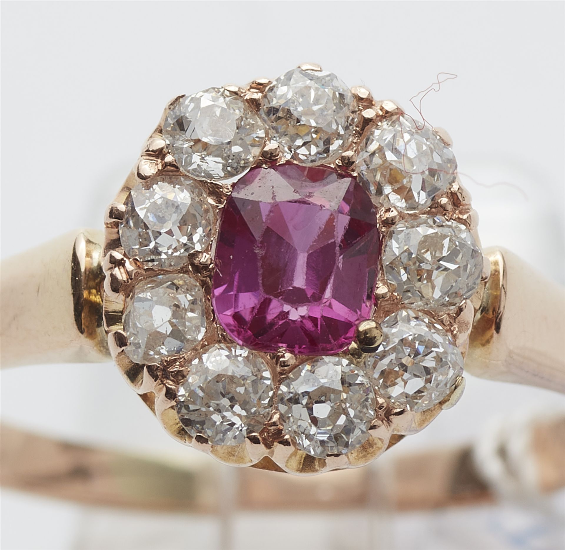 A 14k rose gold diamond and pink Burmese ruby cluster ring. - Image 3 of 3