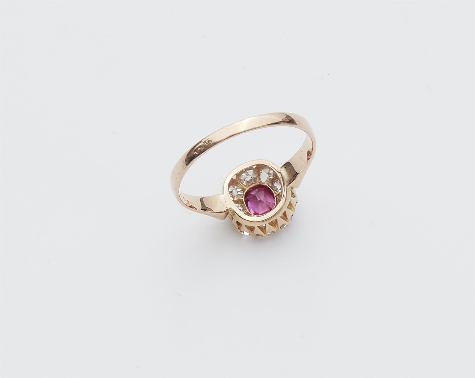 A 14k rose gold diamond and pink Burmese ruby cluster ring. - Image 2 of 3