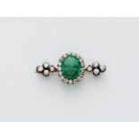 A late 19th century 14k gold and diamond pin brooch with a detachable fine emerald.