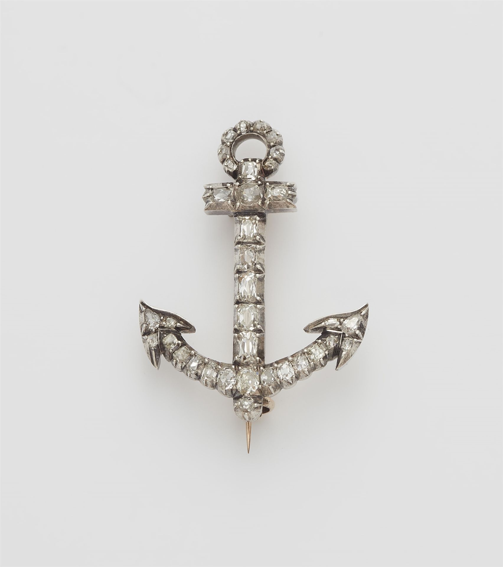 An early 19th century 14k gold, silver and diamond anchor brooch.