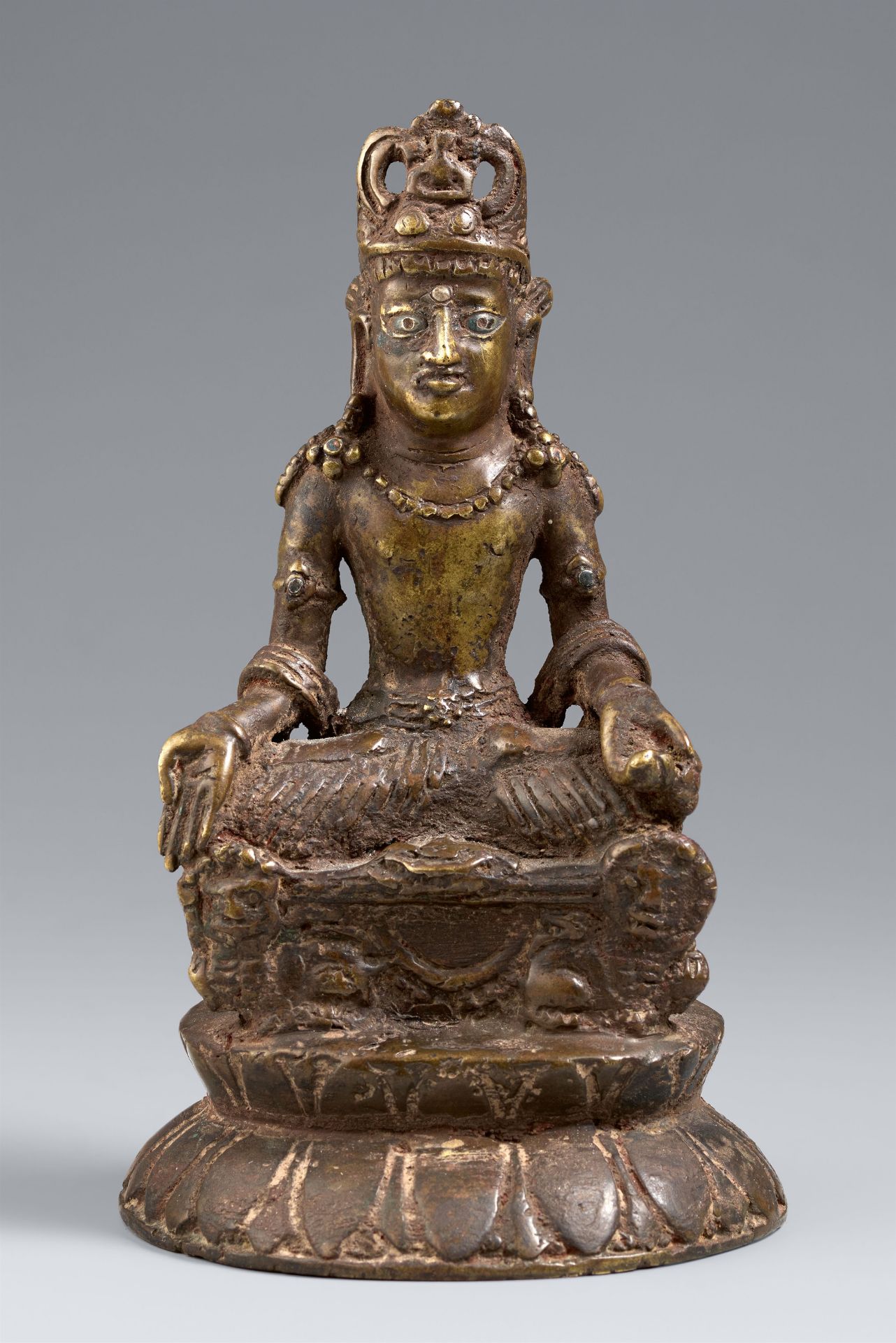 A silver-inlaid bronze figure of Maitreya. Kashmir. In the Swat style of 8th/9th century