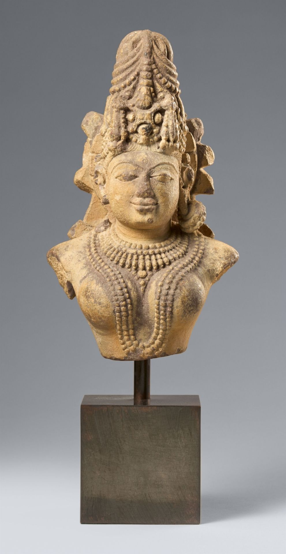 A Central India sandstone bust of a deity. 11th/14th century