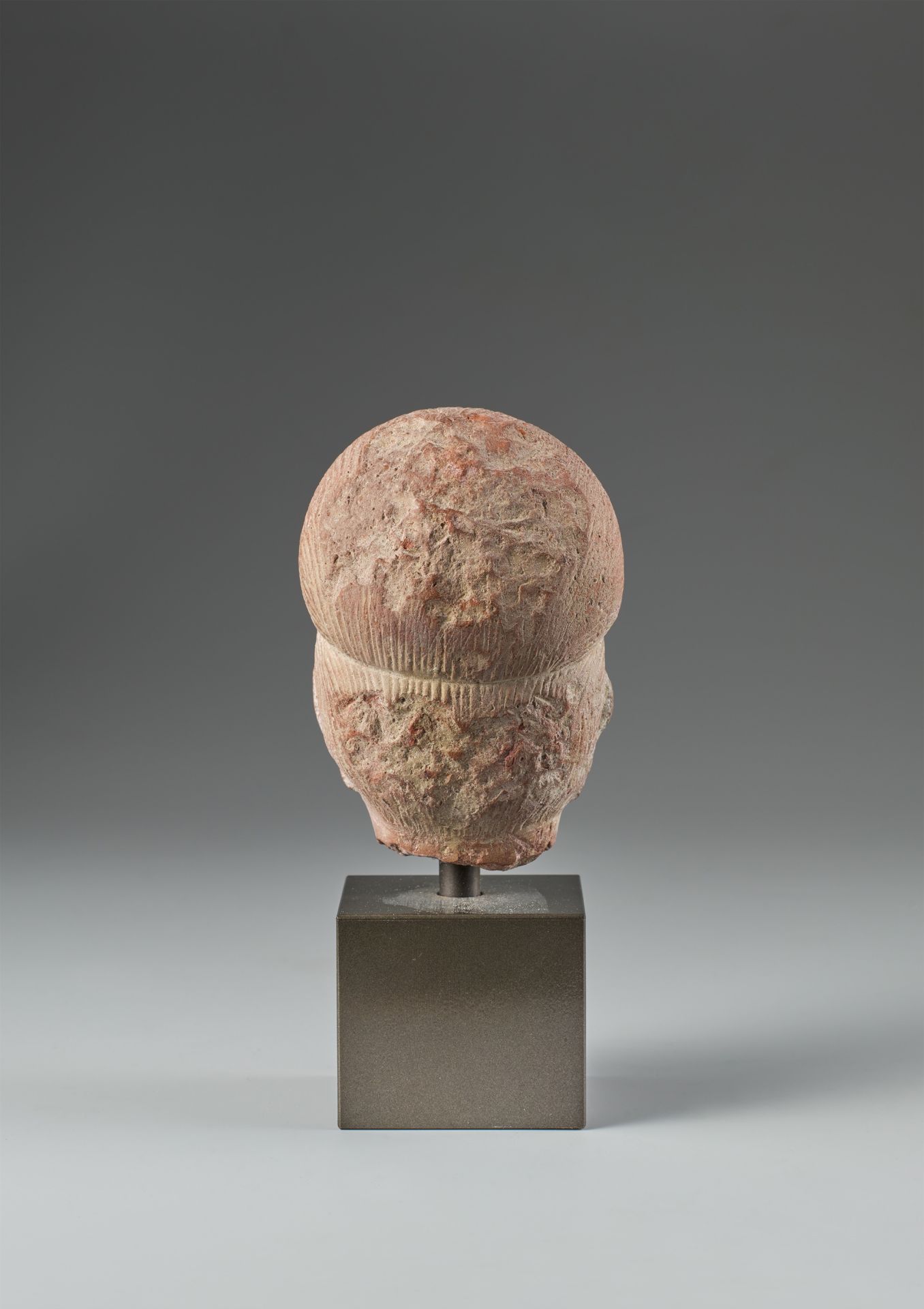 A small red terracotta head of a female. Central India. Possibly Gupta period - Image 2 of 2