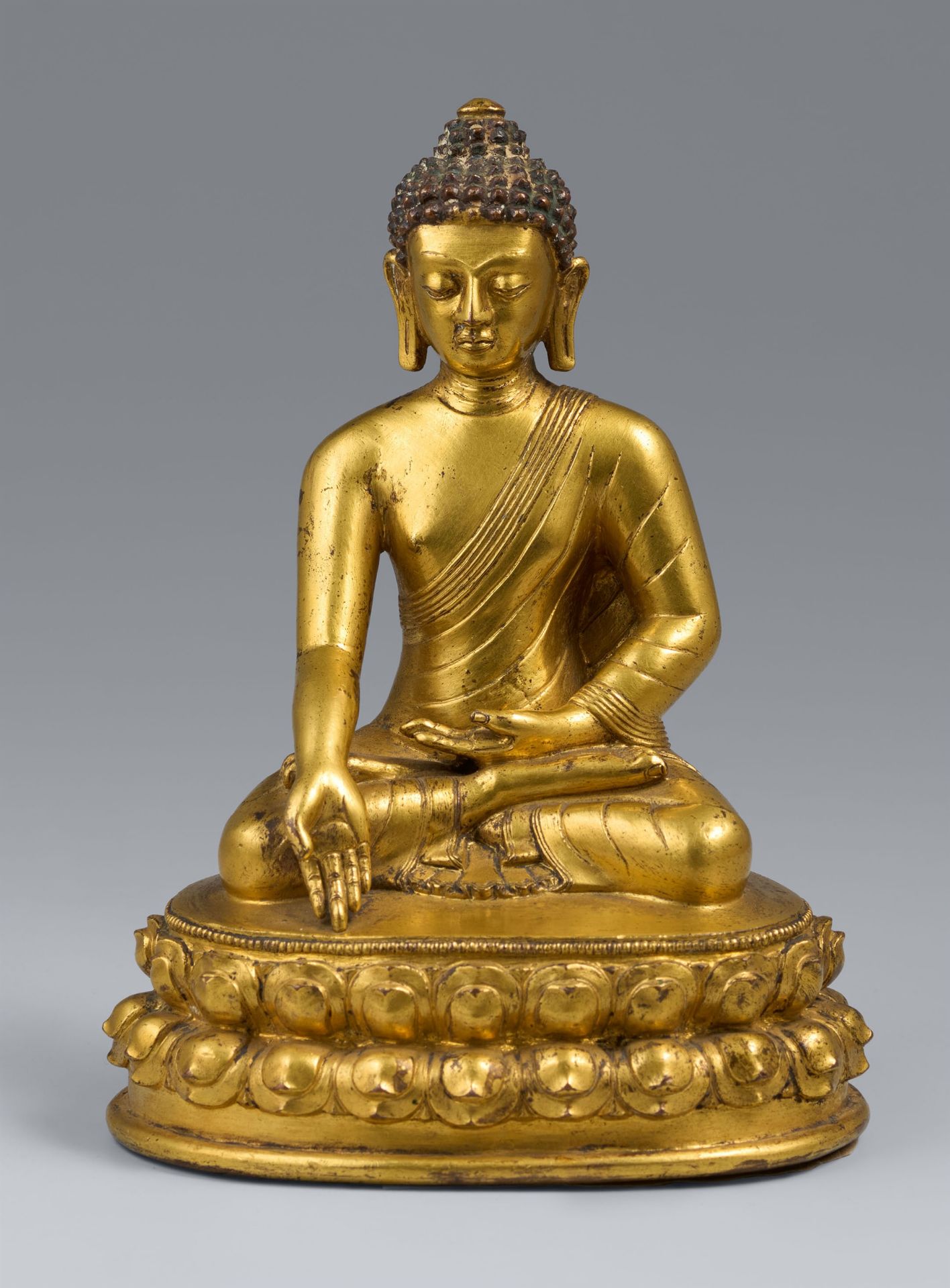 A gilt bronze figure of buddha Bhaisajyaguru (Healing Buddha). 15th/16th century