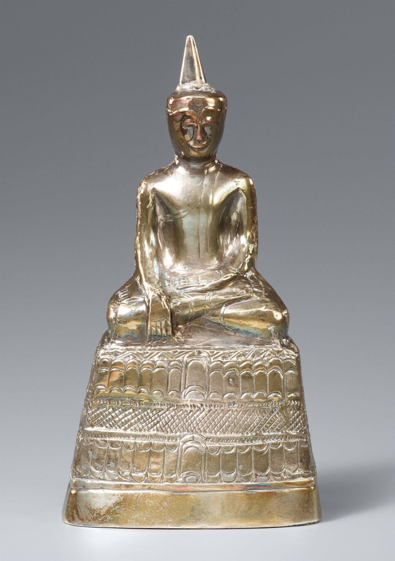 A thai sheet silver votive Buddha. 20th century