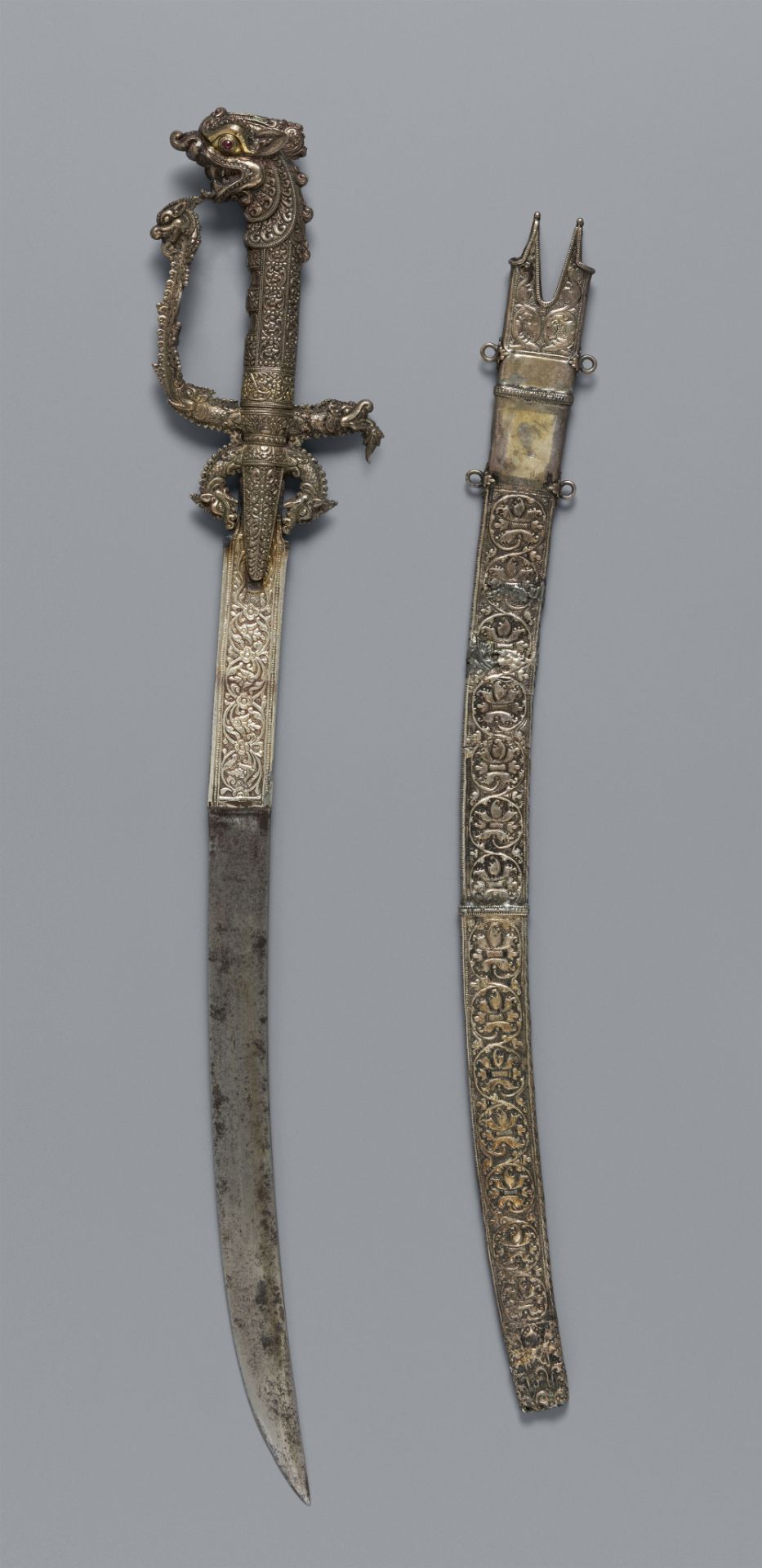 A Kandyan silver sword and scabbard (kasthane). Sri Lanka. Kandy period, 19th century