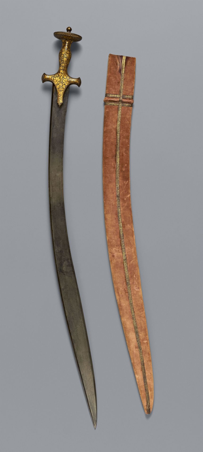 A North Indian Mughal sword (tulwar) with scabbard. 18th/19th century