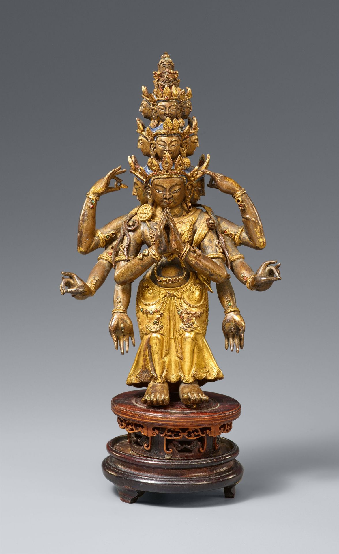 A Sinotibetan gilt bronze figure of Ekadasamukha-Avalokitesvara. 18th century