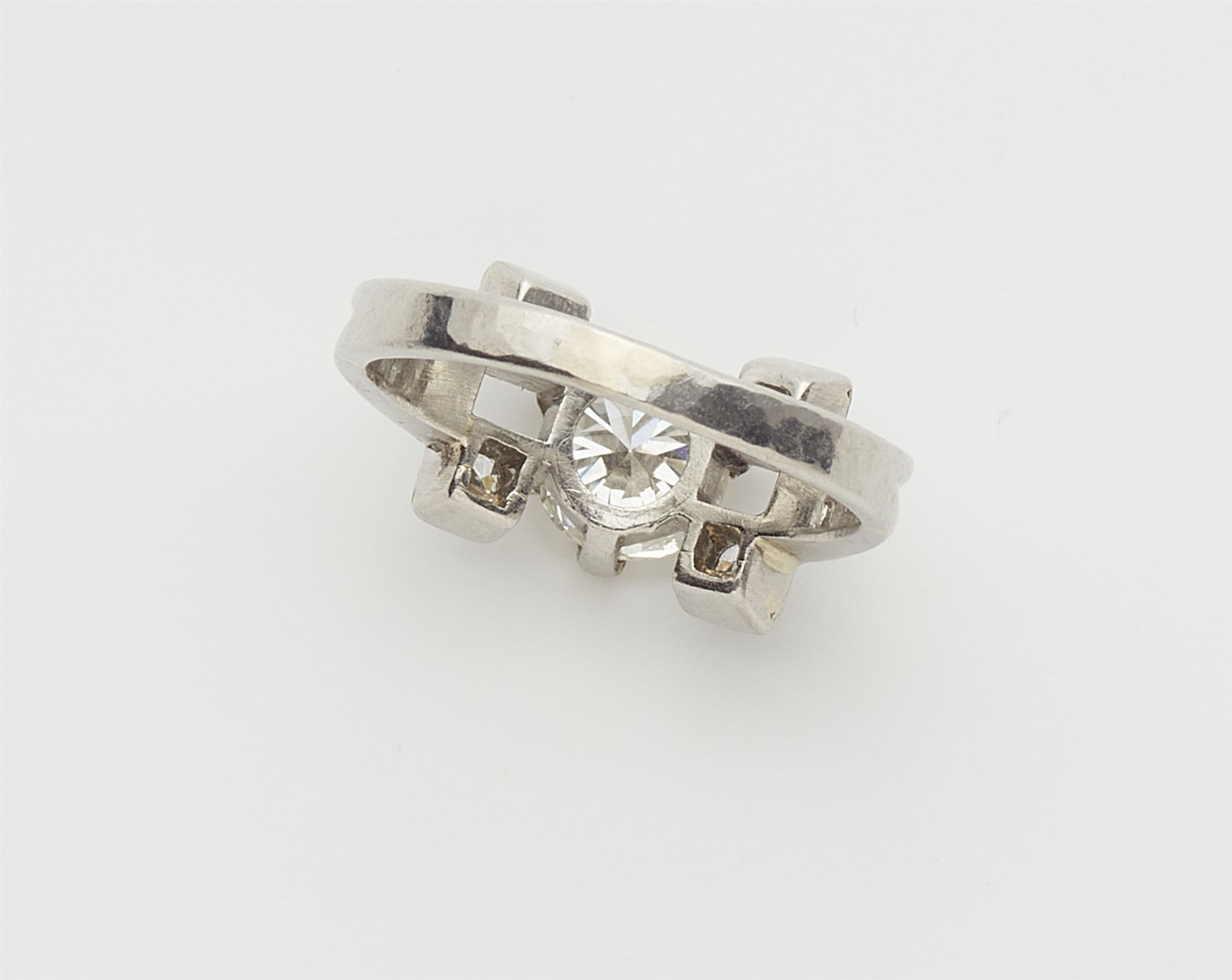 A platinum and diamond five stone ring. - Image 3 of 3