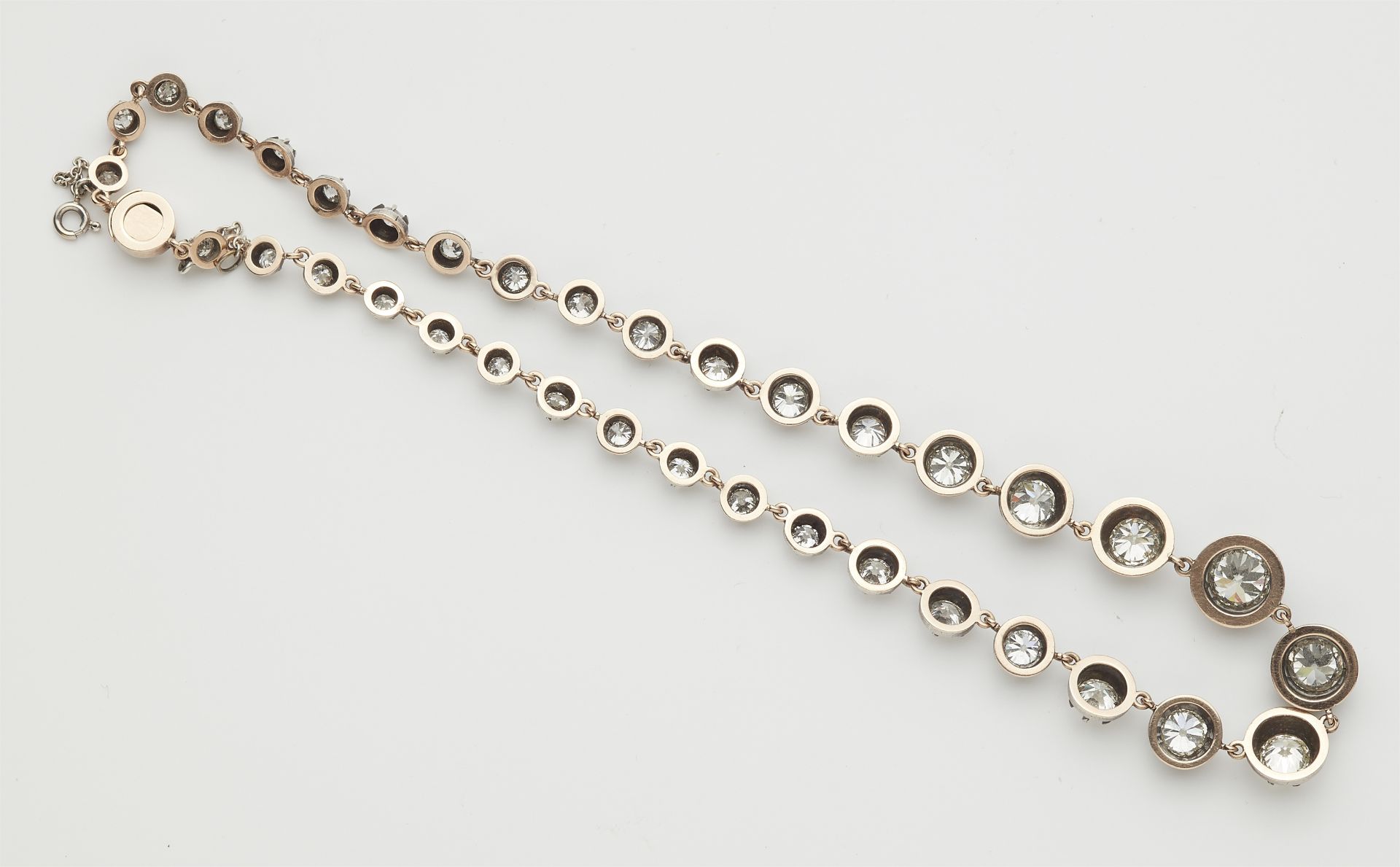 A 19th century silver 14k red gold and diamond riviere necklace (total ca. 18.18 cts ). - Image 2 of 3
