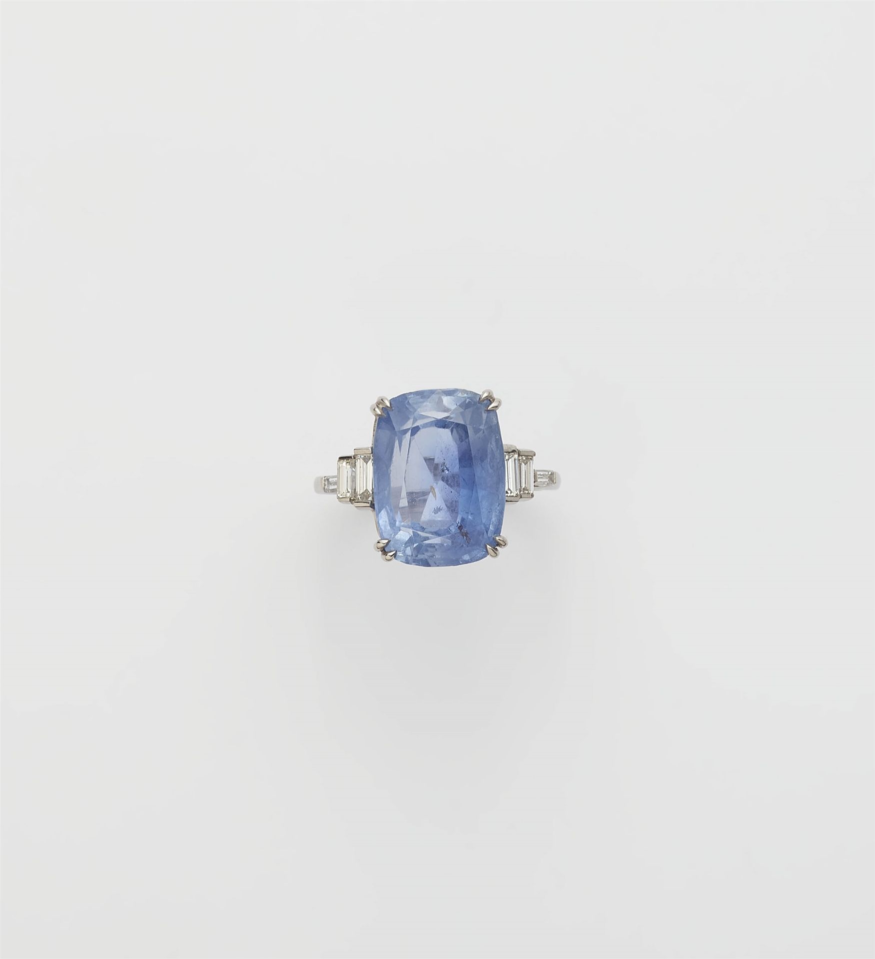 A platinum diamond and natural Ceylon sapphire ring.