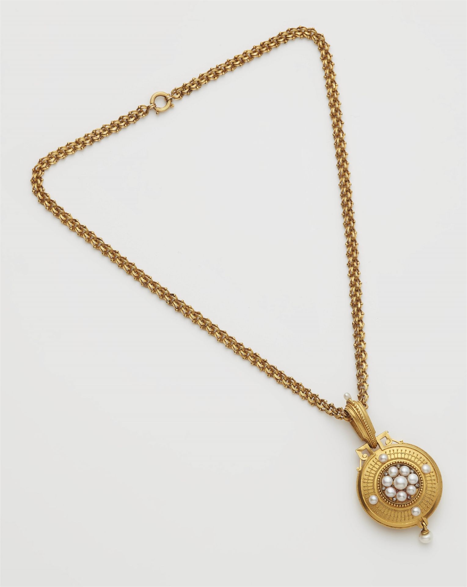 An Archeological Revival 18k gold granulation pearl and diamond locket with chain necklace.