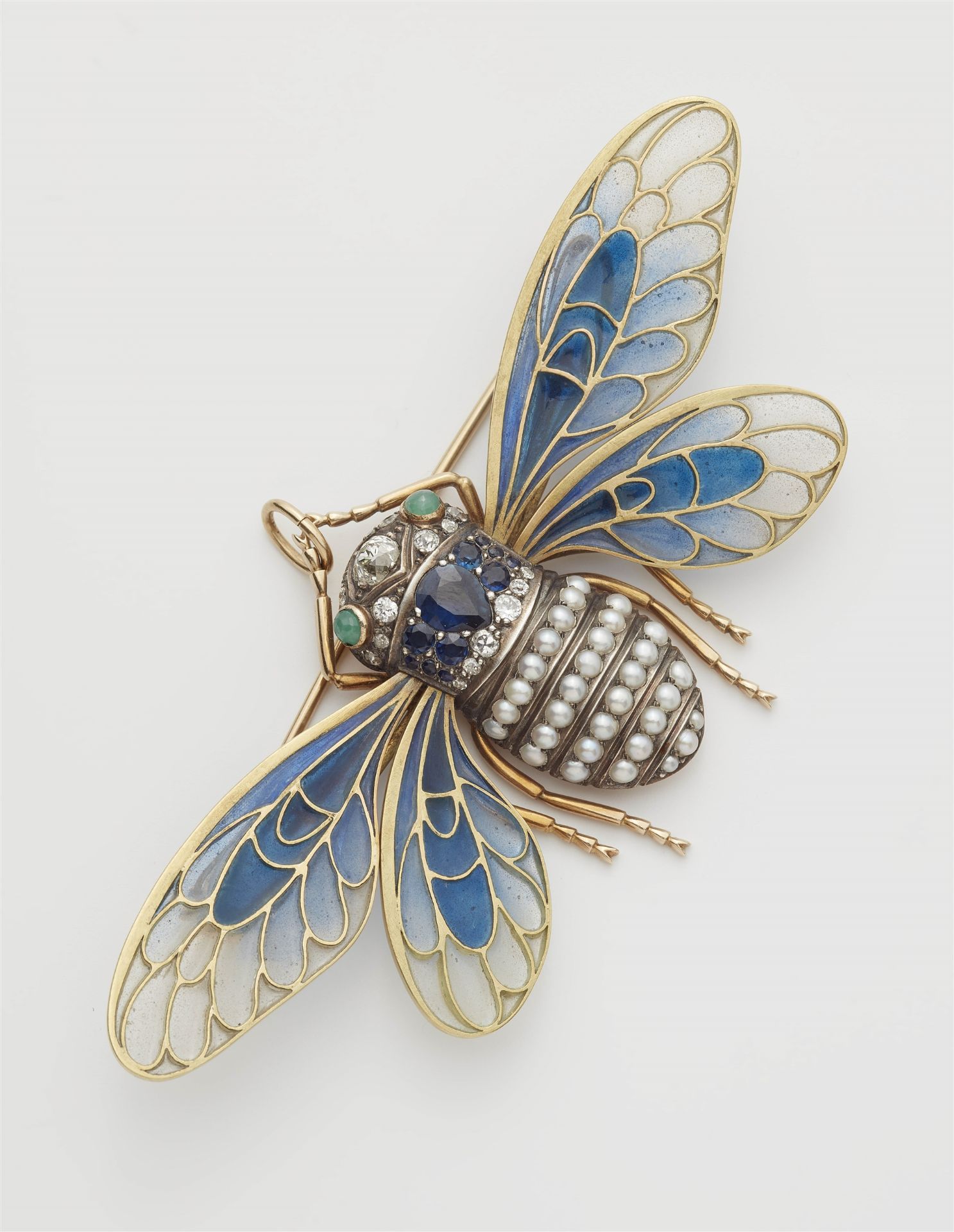 An Art Nouveau 14k gold enamel plique à jour cicada brooch.