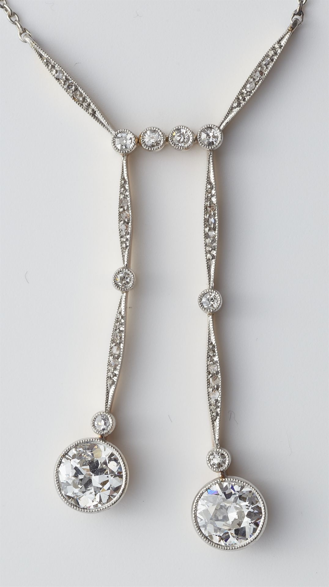 A 14k gold diamond negligé pendant necklace with two transitional-cut diamond solitaires. - Image 2 of 4