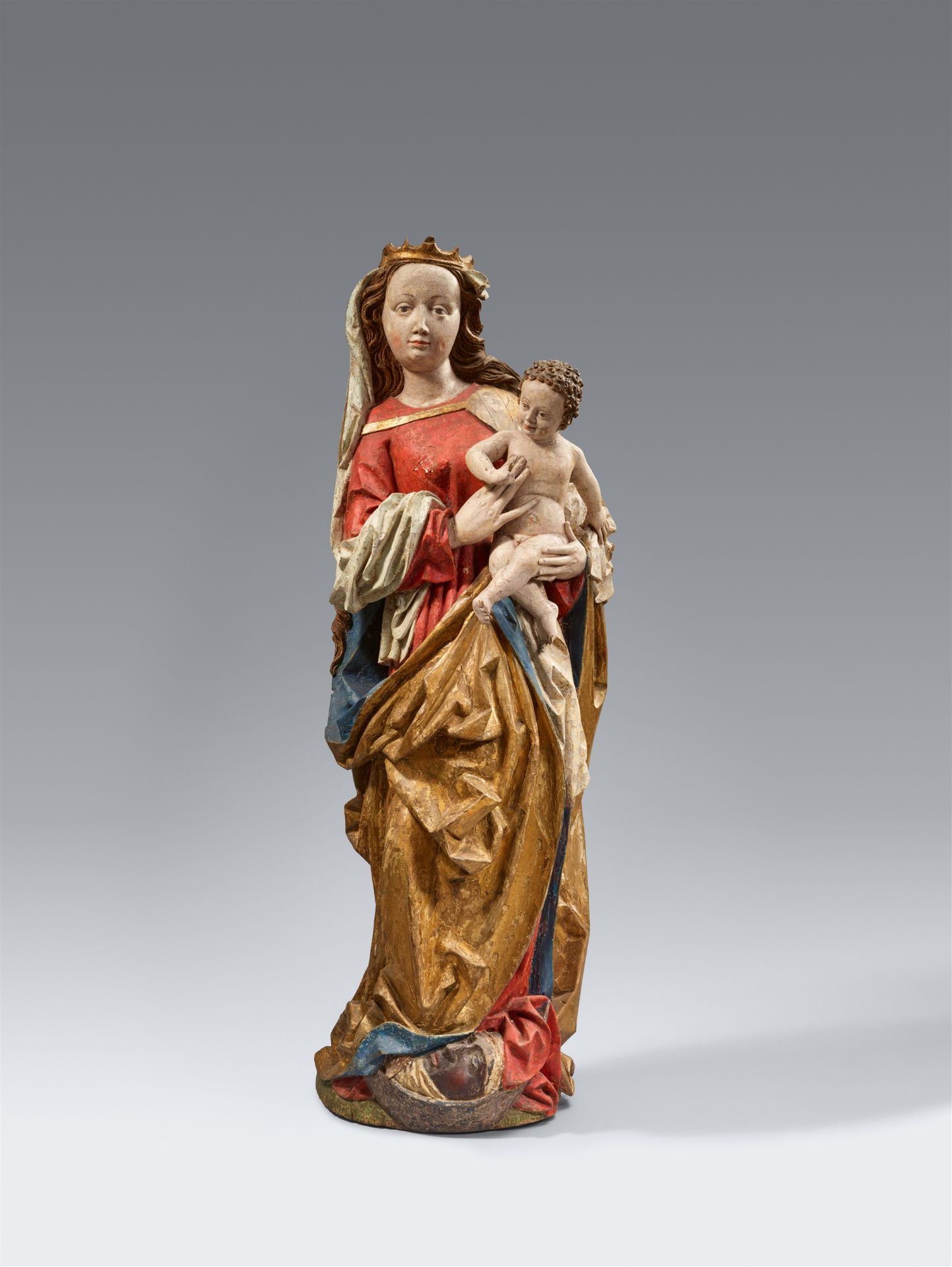 A Franconian carved wood figure of the Virgin and Child, circa 1480/1490
