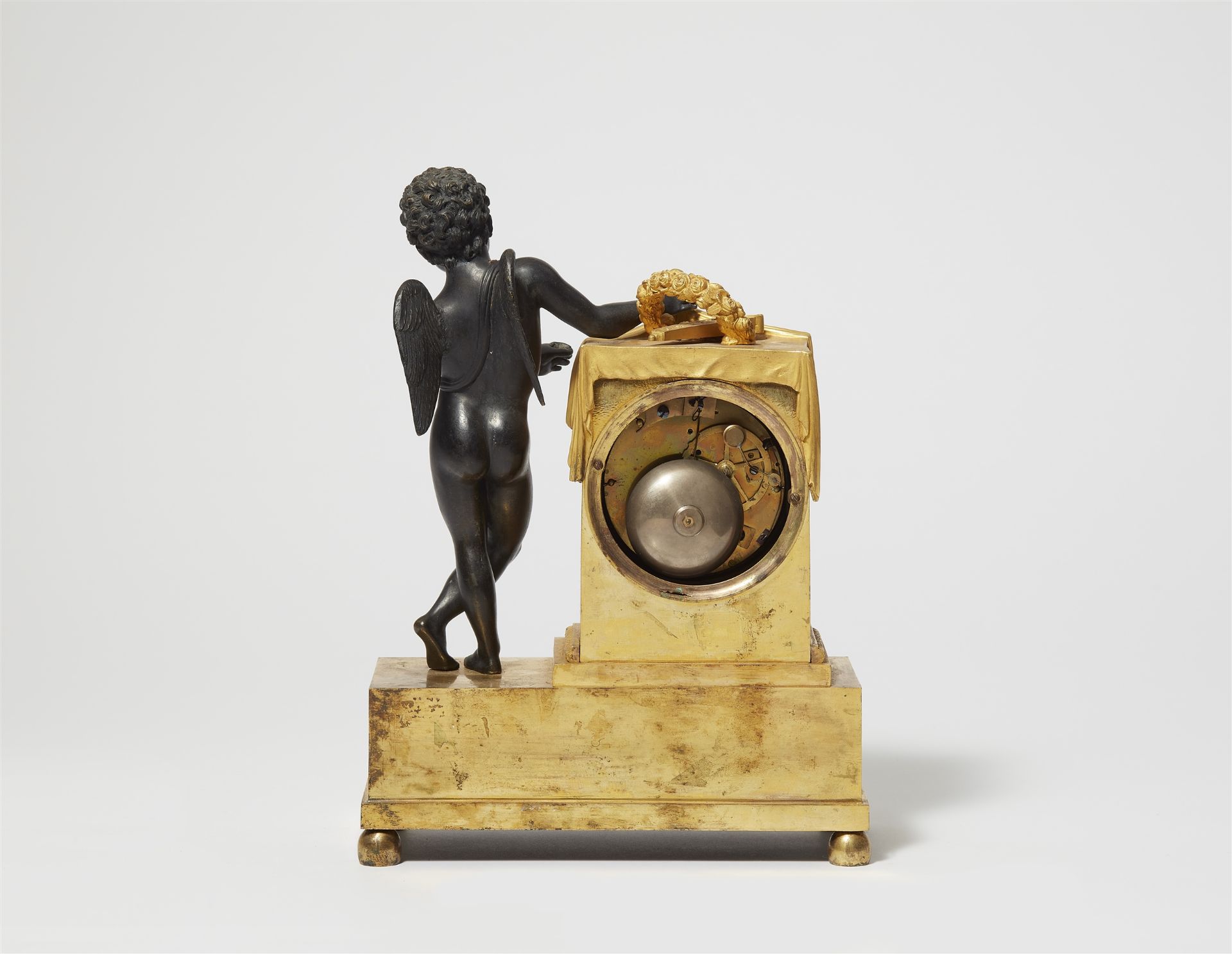 A Parisian gilt and patinated bronze pendulum clock with Cupid revealing time - Image 2 of 2