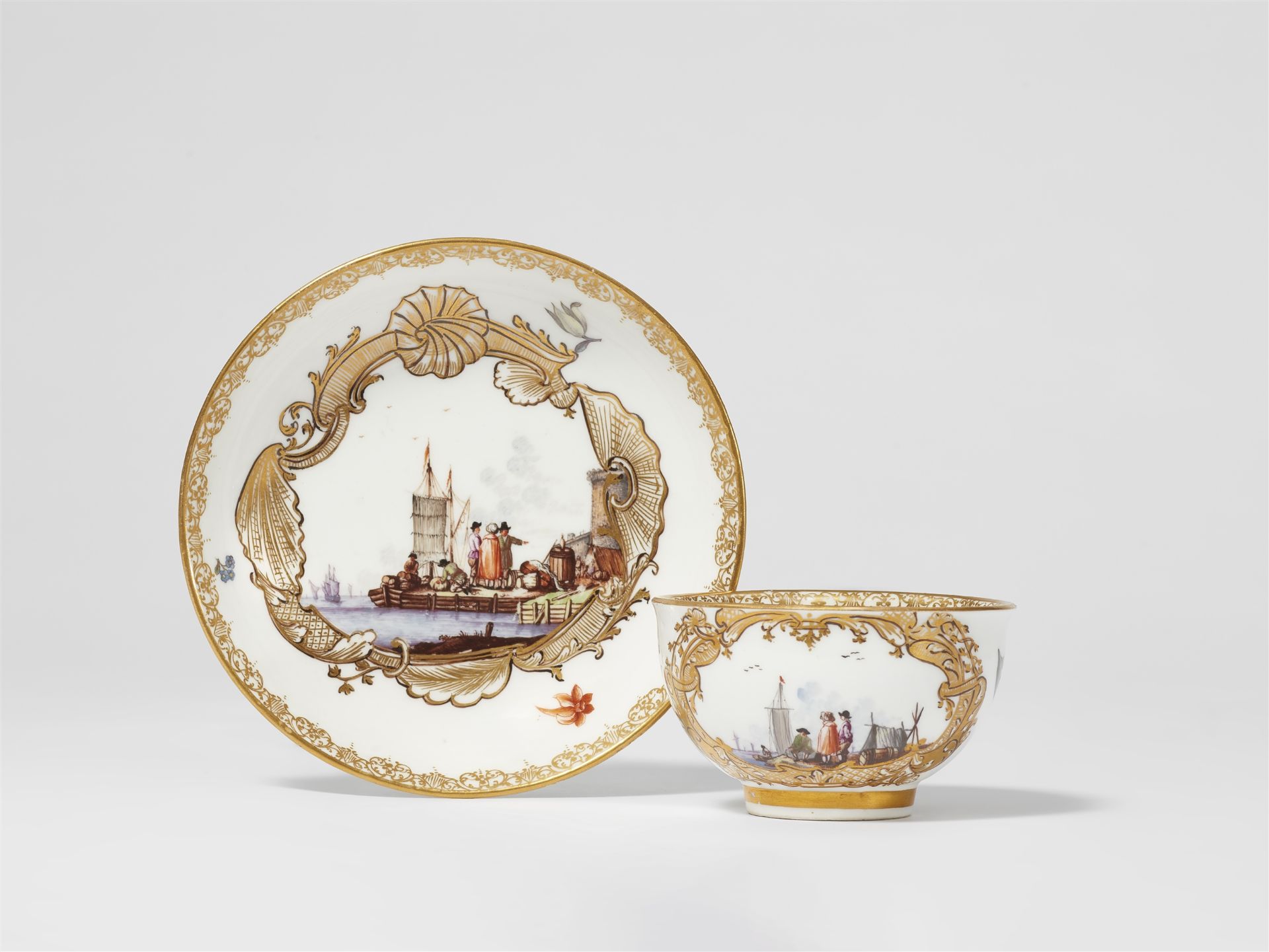 A Meissen porcelain tea bowl and saucer with merchant navy scenes