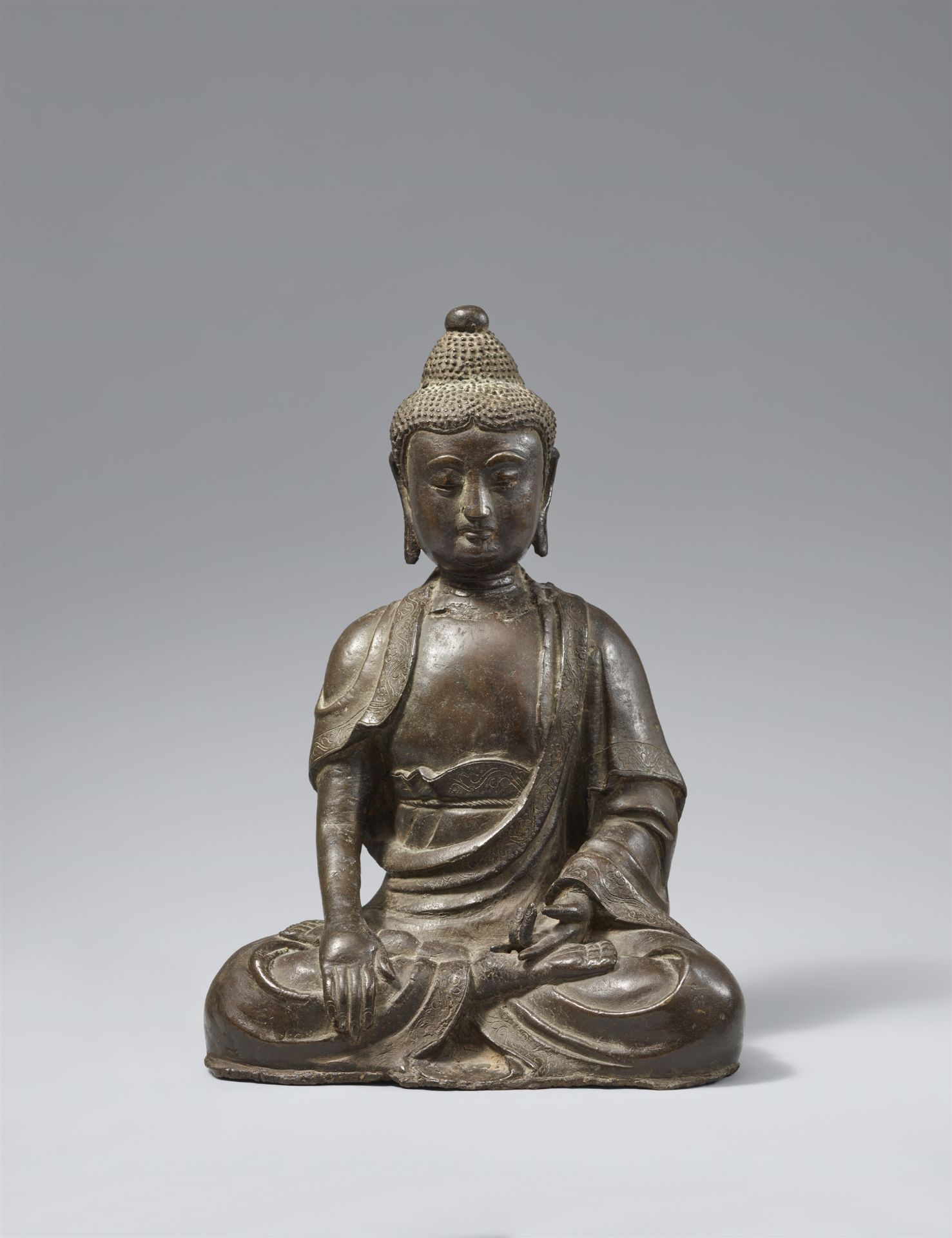 A heavily cast bronze figure of Buddha Shakyamuni. Ming dynasty, 17th century